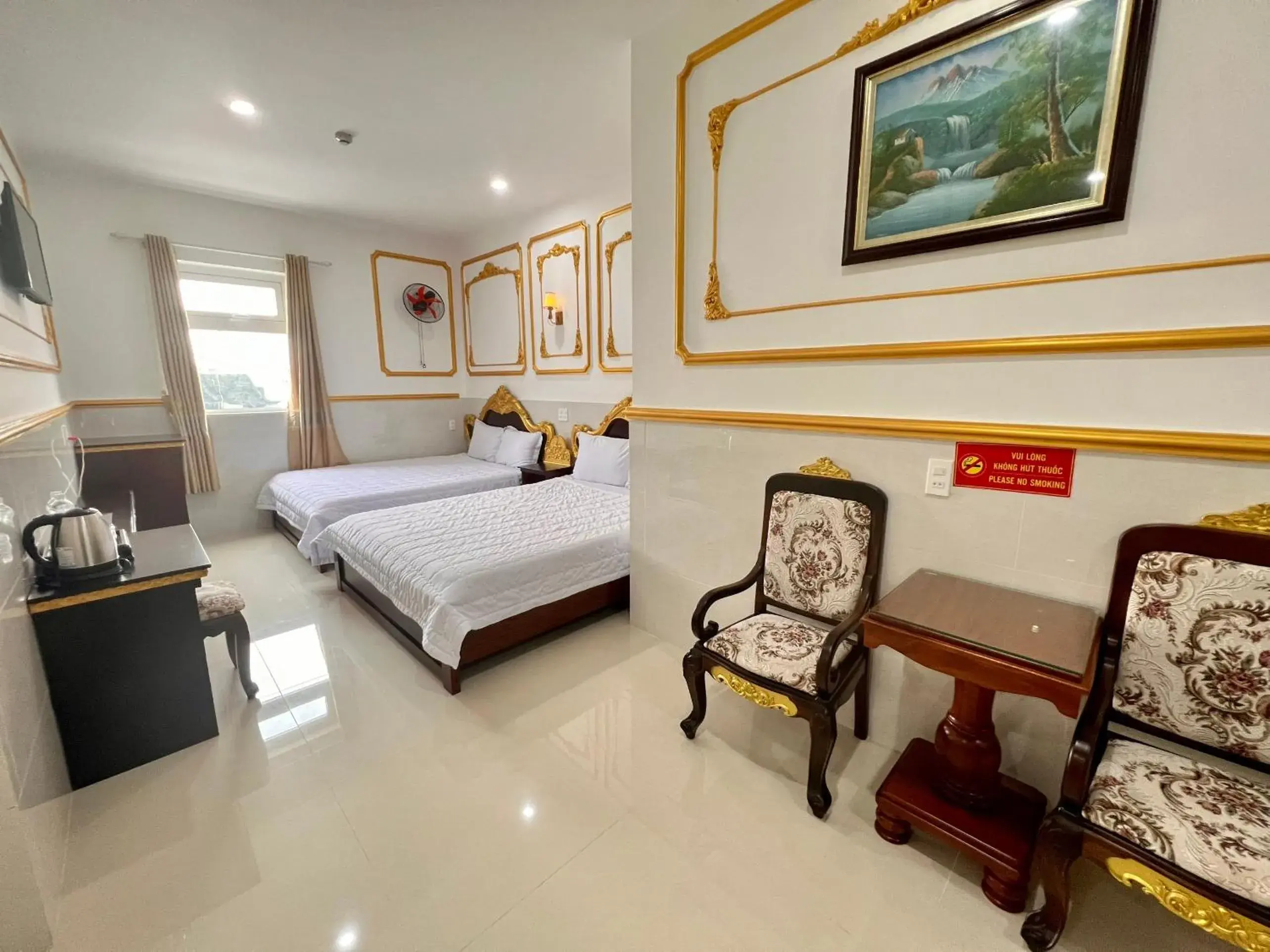 Deluxe Queen Room with Two Queen Beds in King Hotel Quang Ngai Deluxe Queen Room with Two Queen Beds in King Hotel Quang Ngai