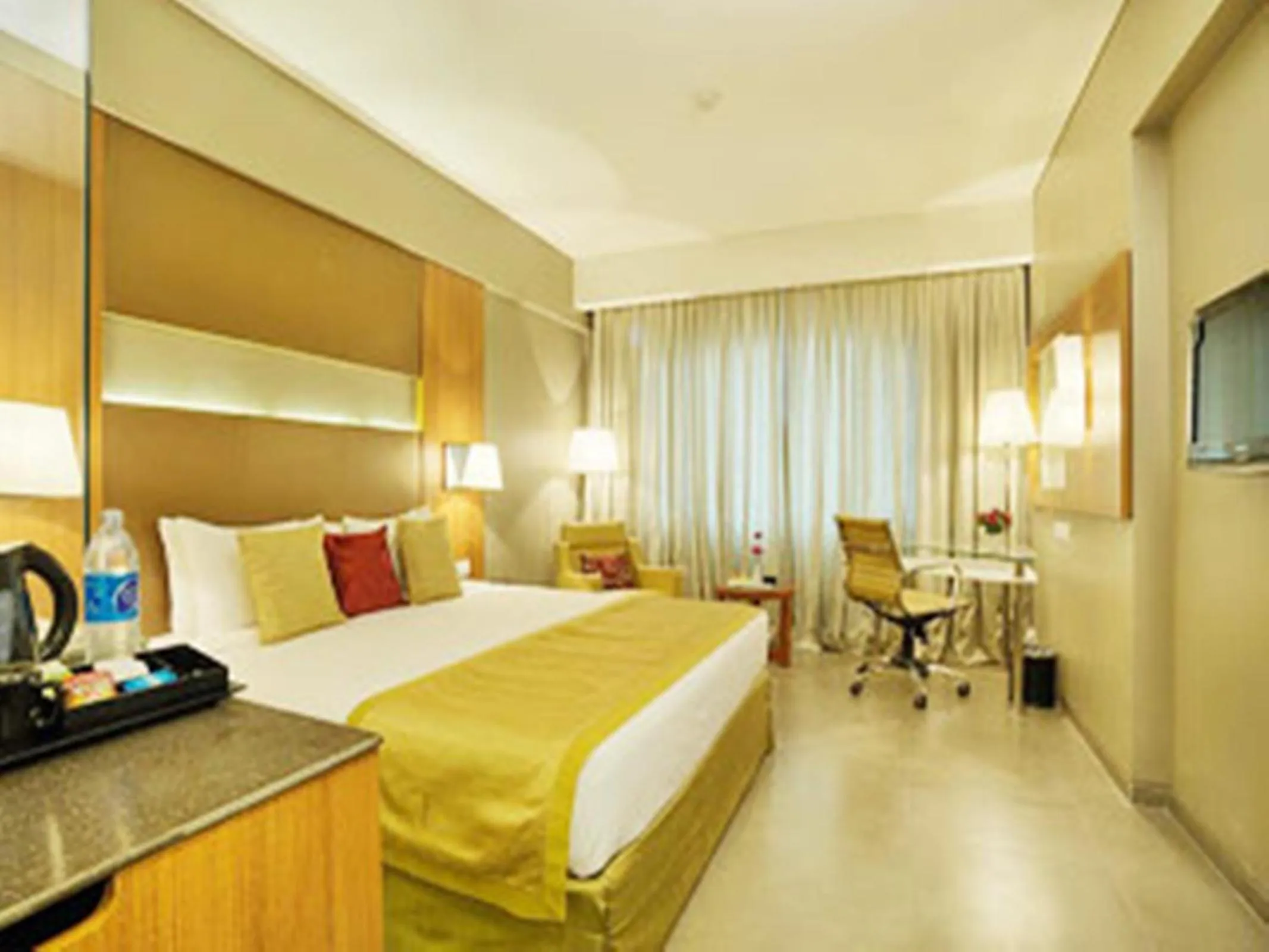 TV and multimedia, Bed in Royal Orchid Central Vadodara