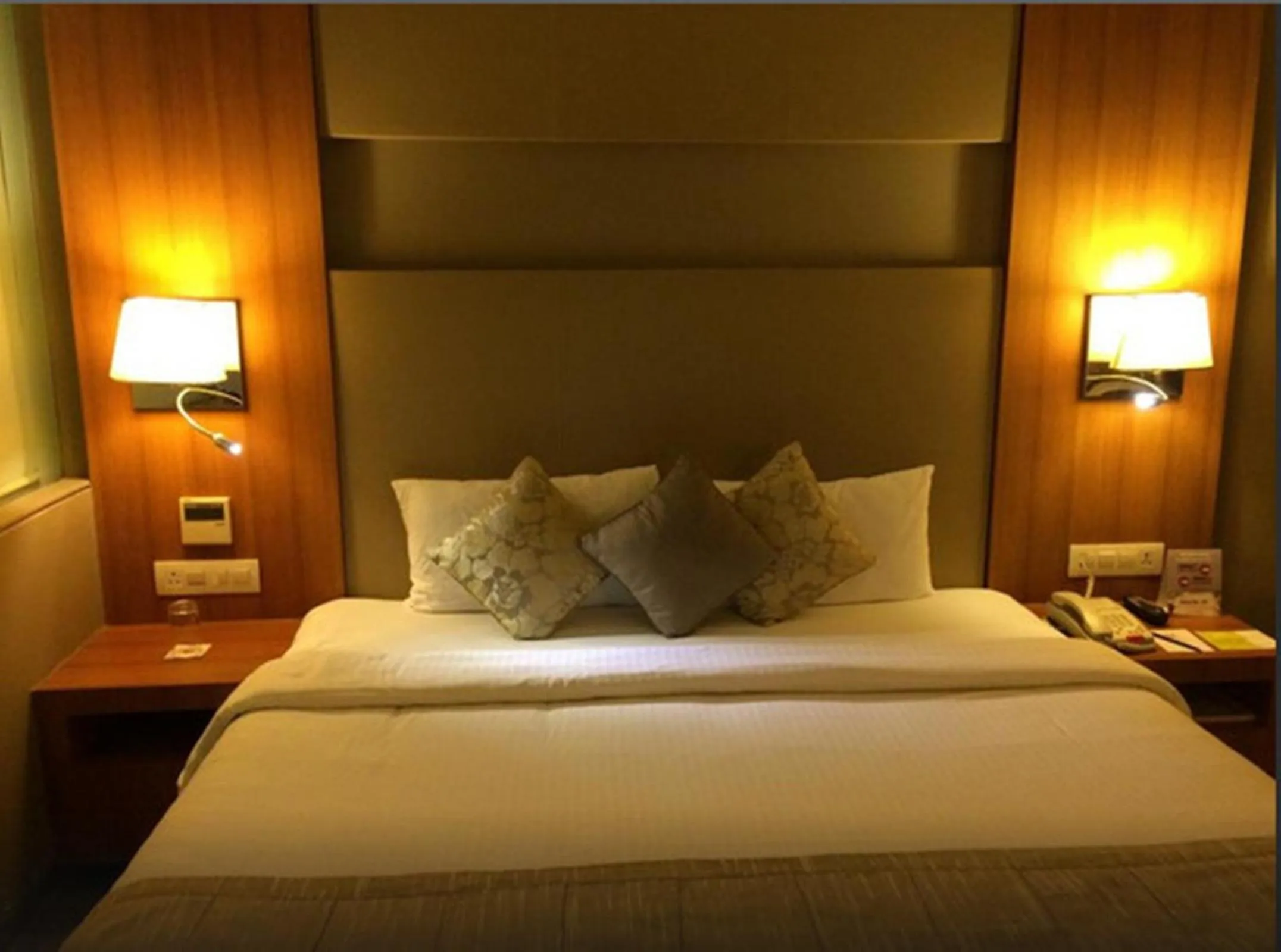 Bedroom, Bed in Royal Orchid Central Vadodara