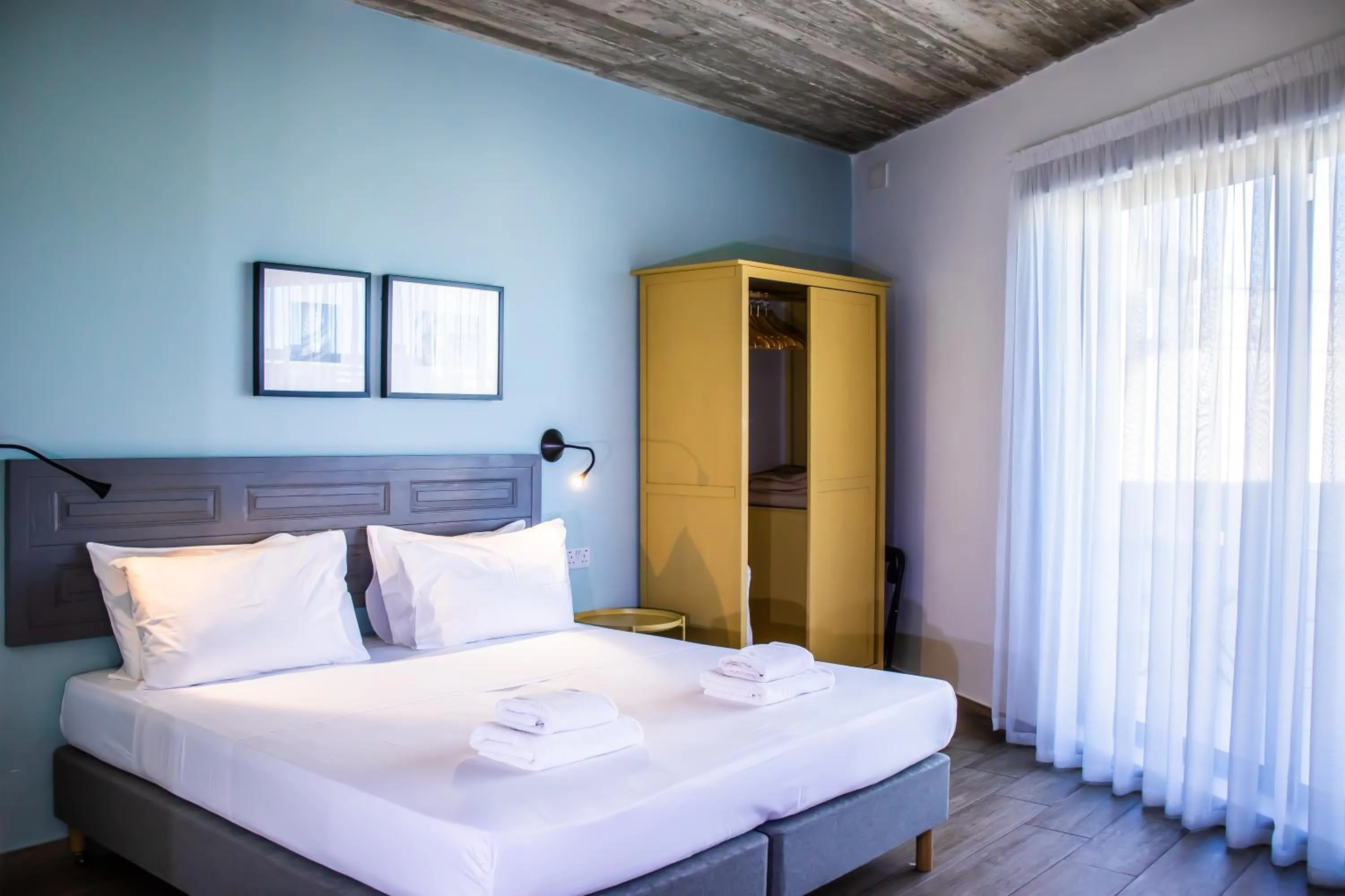 Bed in Chapter 5 Hotel