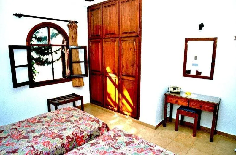 Bed in Eleni Apartments