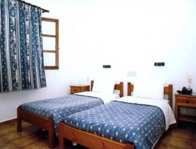 Bed in Eleni Apartments