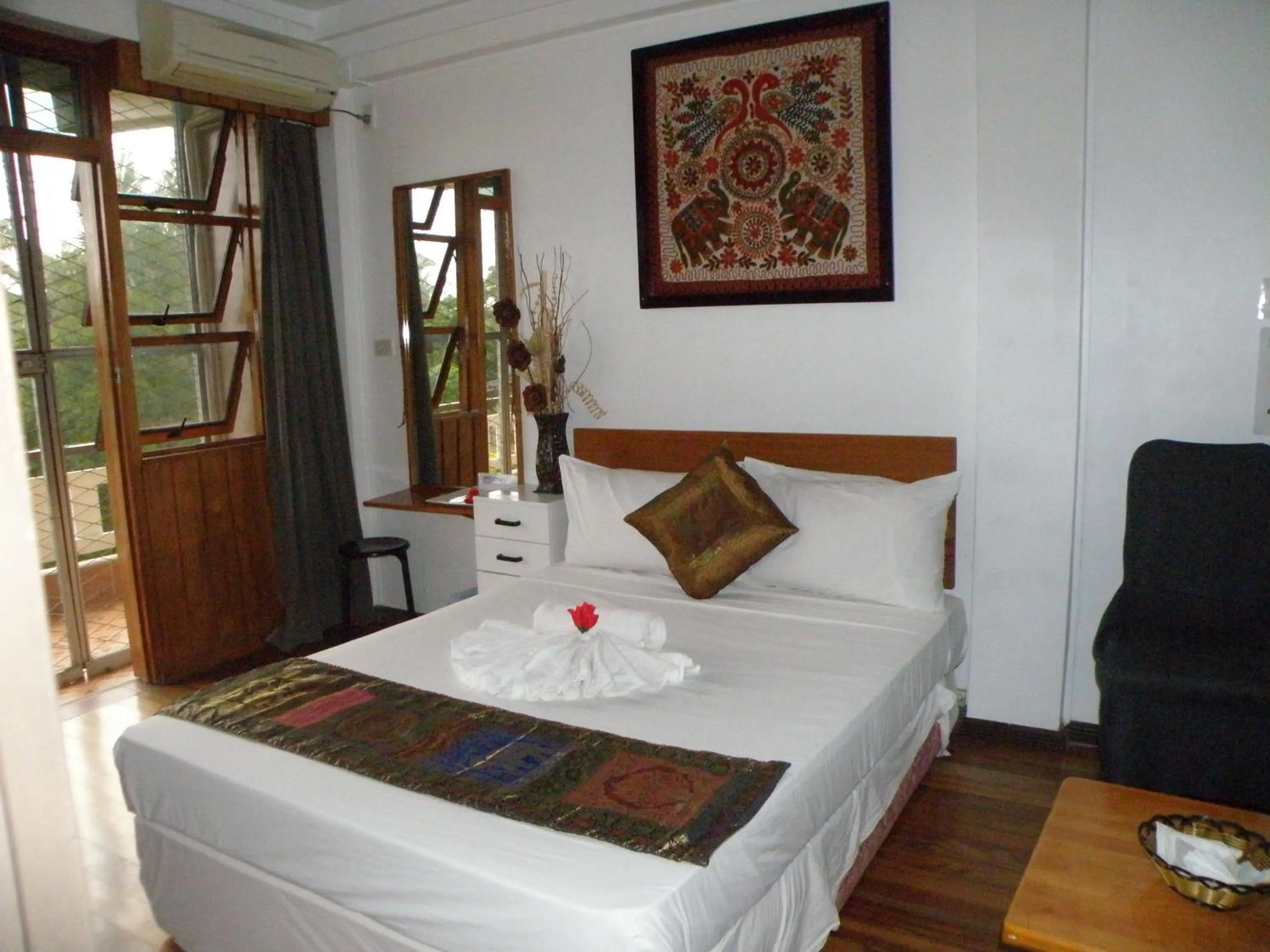 Bed in Tagimoucia House Hotel