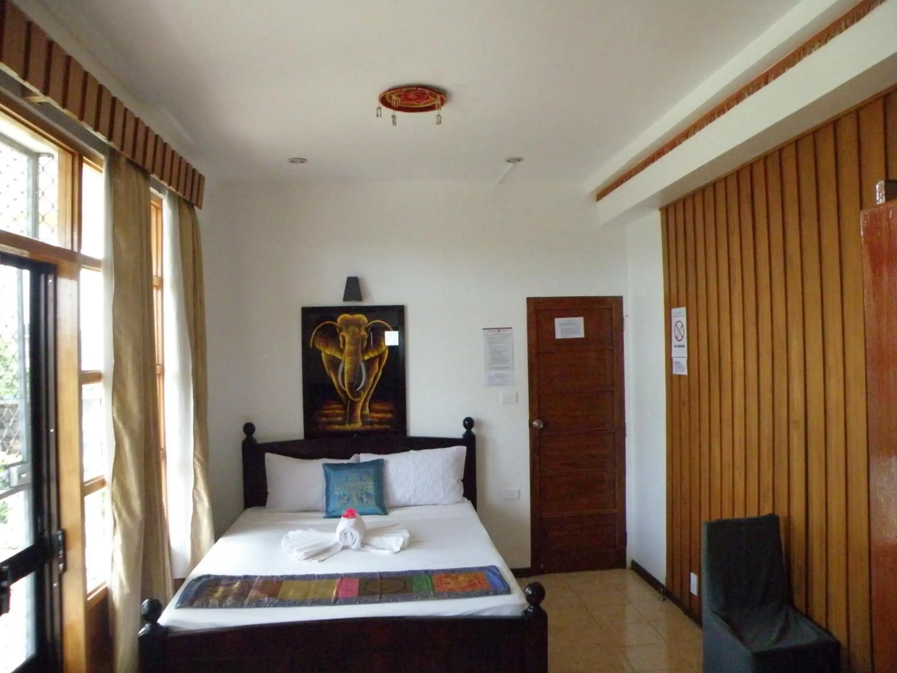 Bed in Tagimoucia House Hotel Bed in Tagimoucia House Hotel