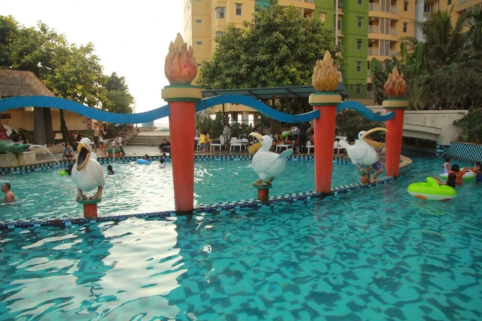 Swimming pool in Modern Studio Room at Grand Serpong Apartment By Travelio