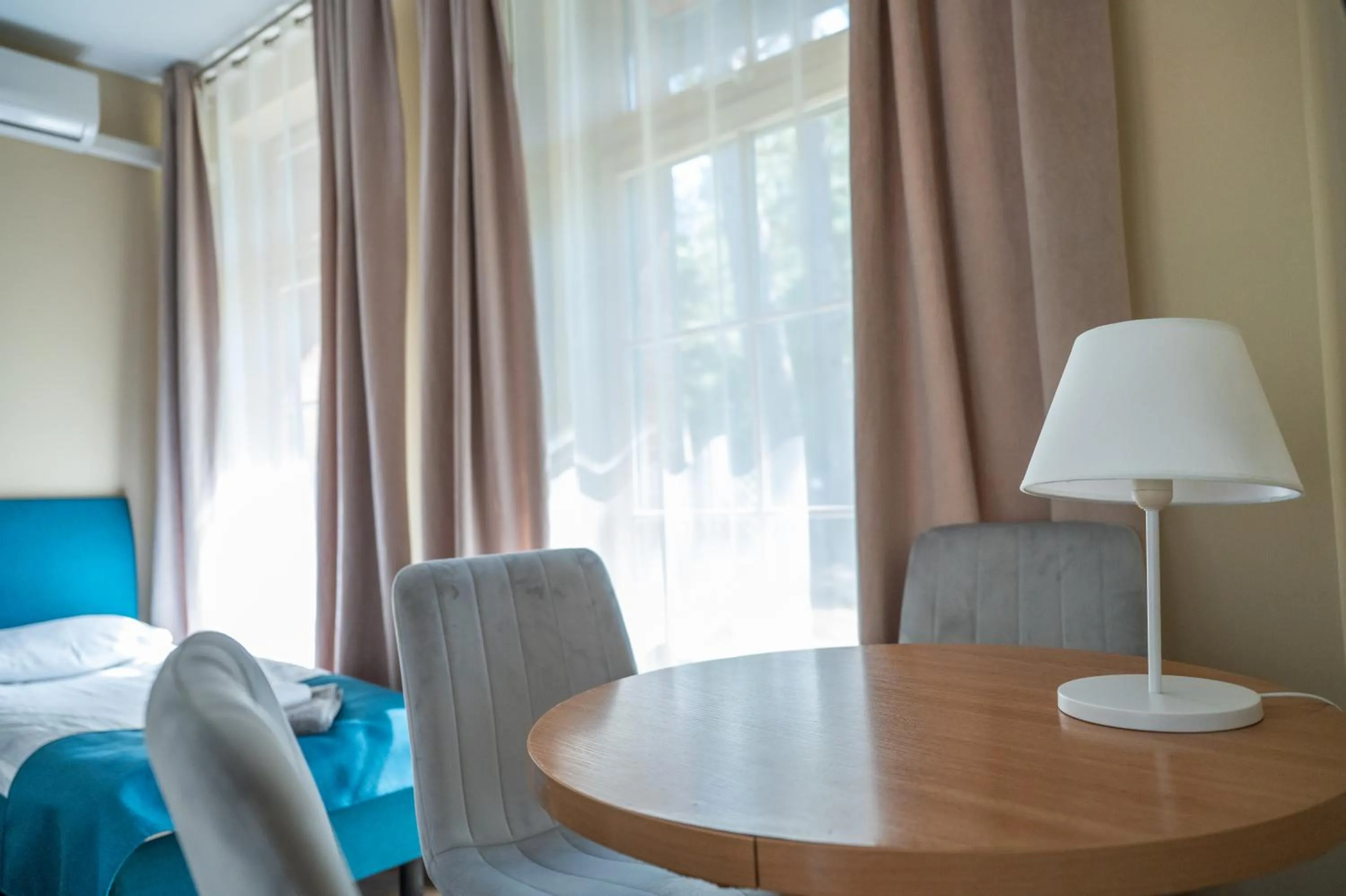 Seating area, Bed in Hotel Palanga Camping