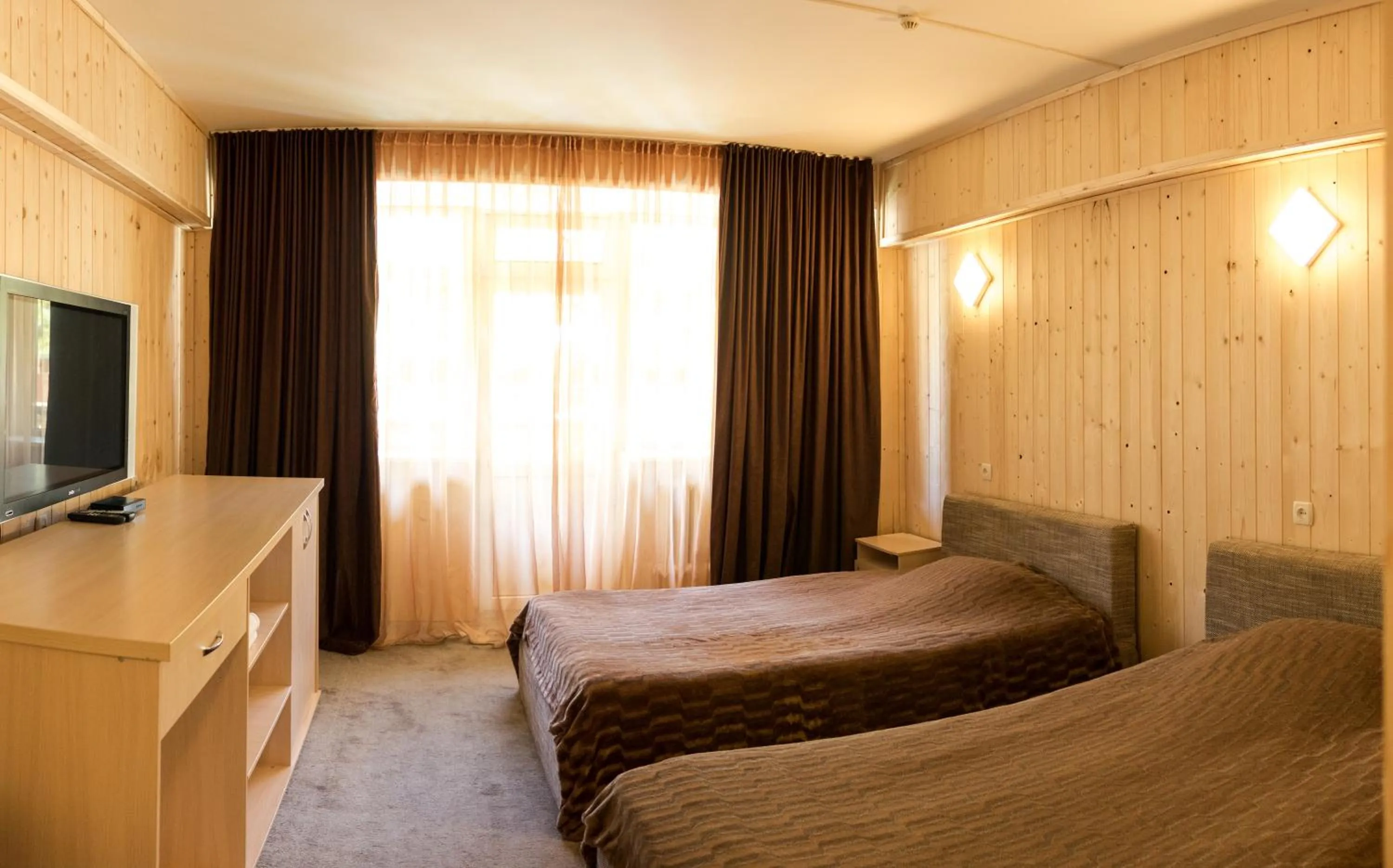 Bed in Shymbulak Resort Hotel