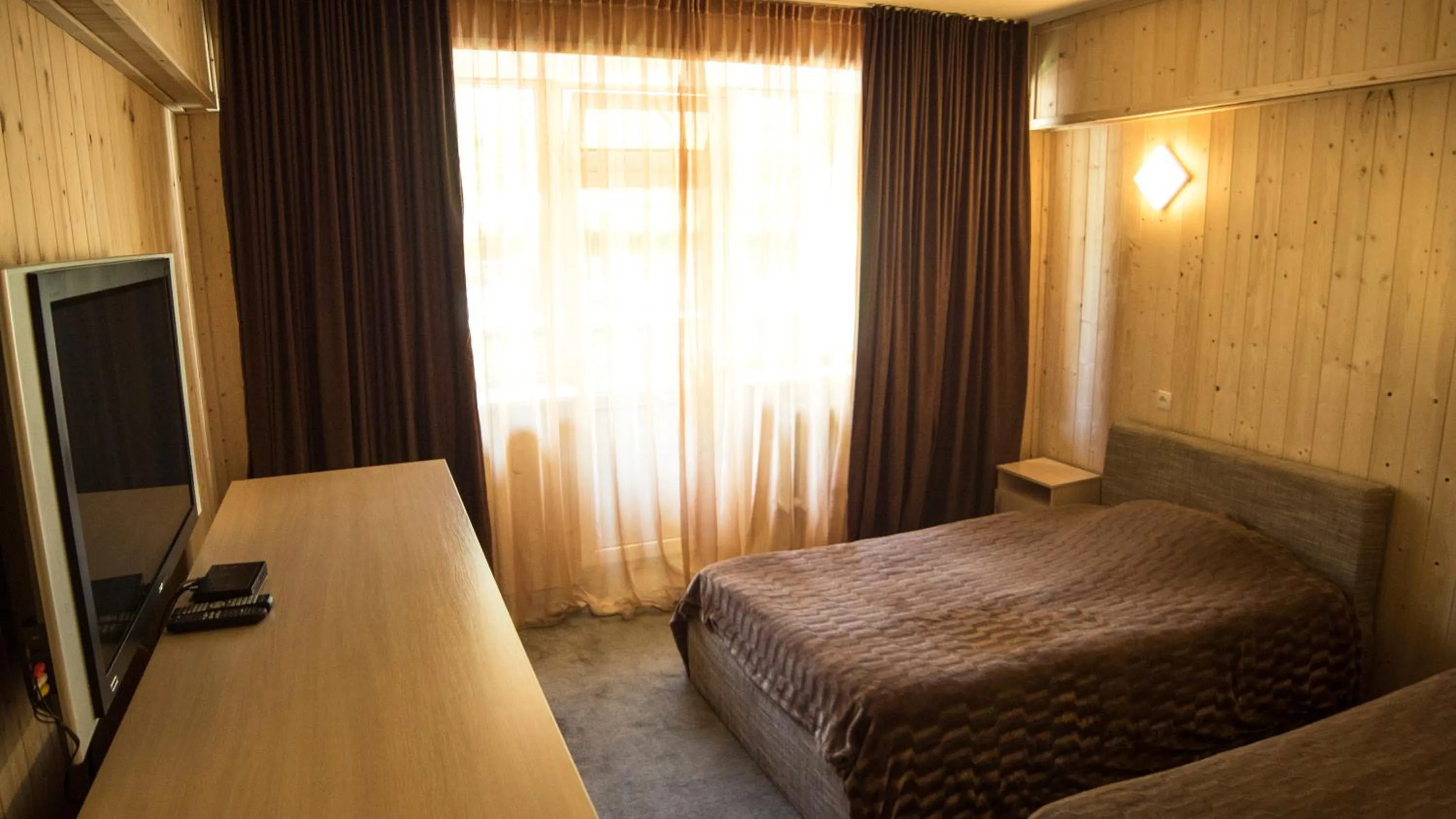 Bed in Shymbulak Resort Hotel