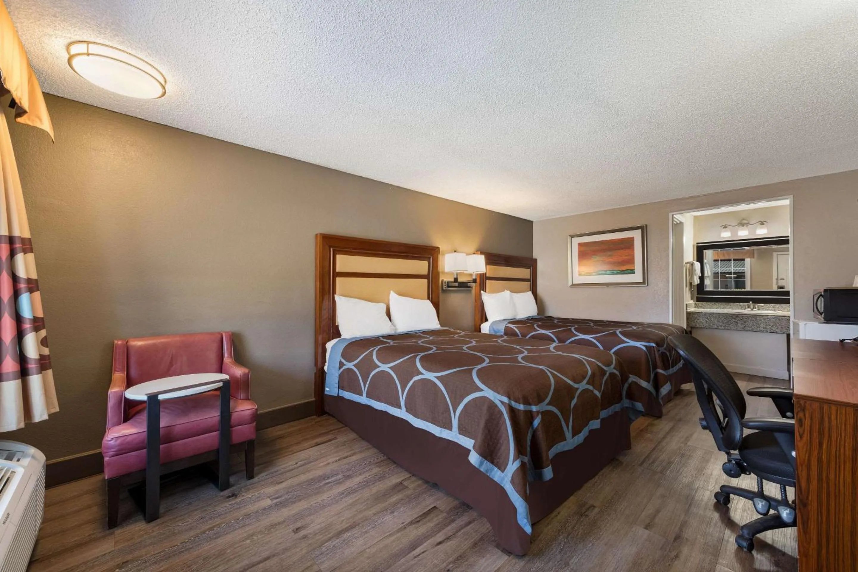 Bedroom, Bed in Rodeway Inn Charlotte Airport Area