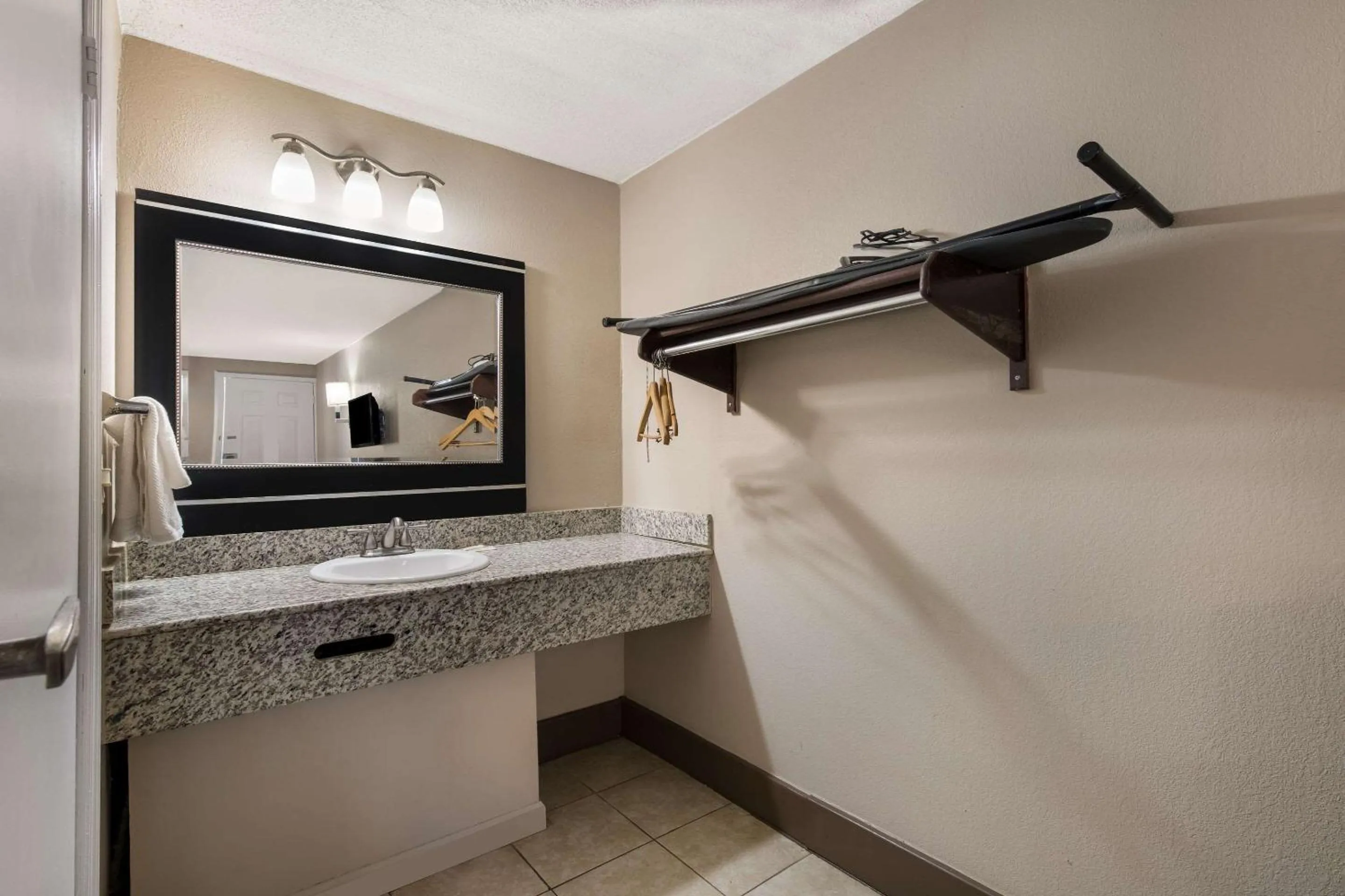 Bedroom in Rodeway Inn Charlotte Airport Area