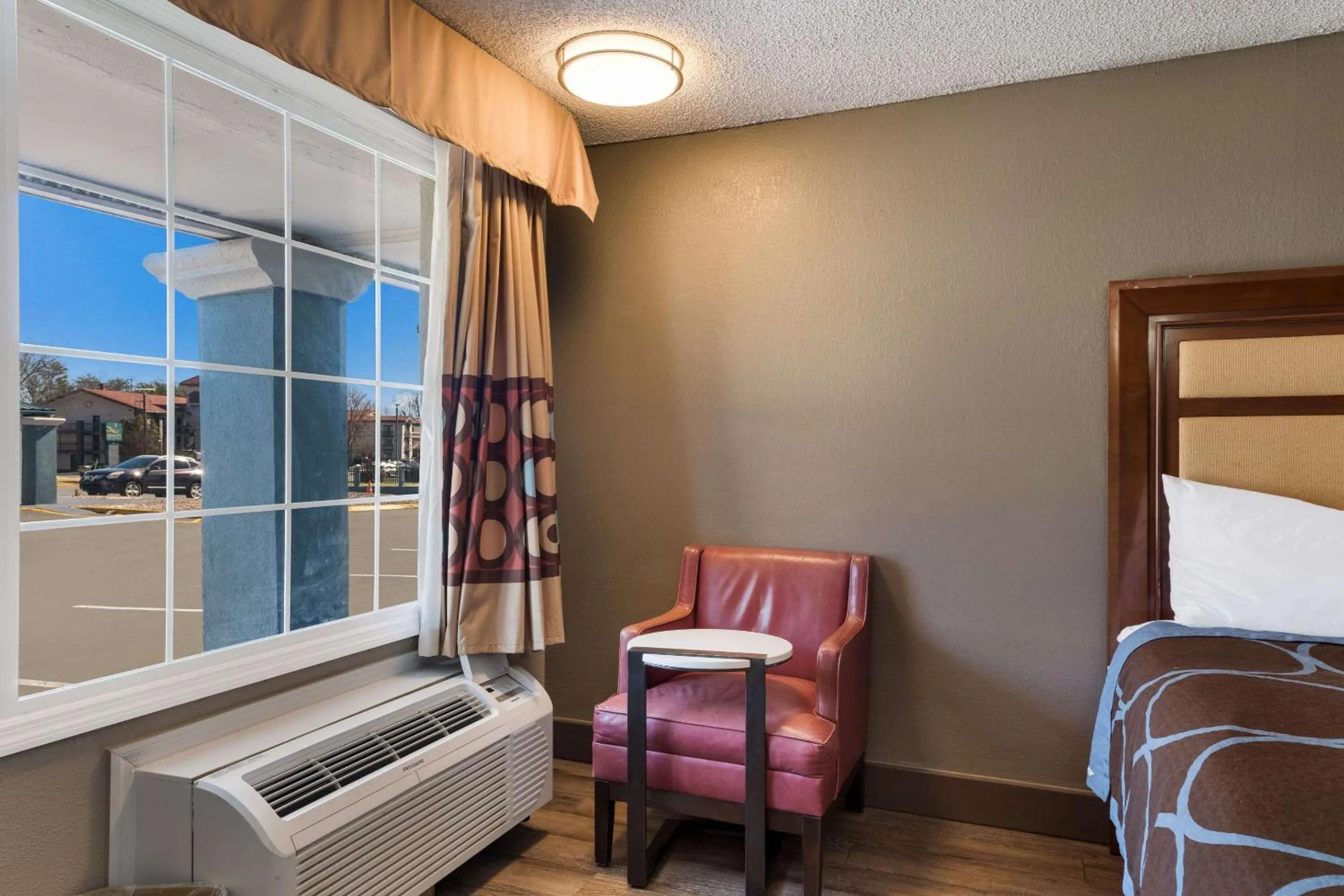 Bedroom in Rodeway Inn Charlotte Airport Area