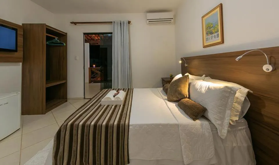 Bed in Pousada Lua e Mar