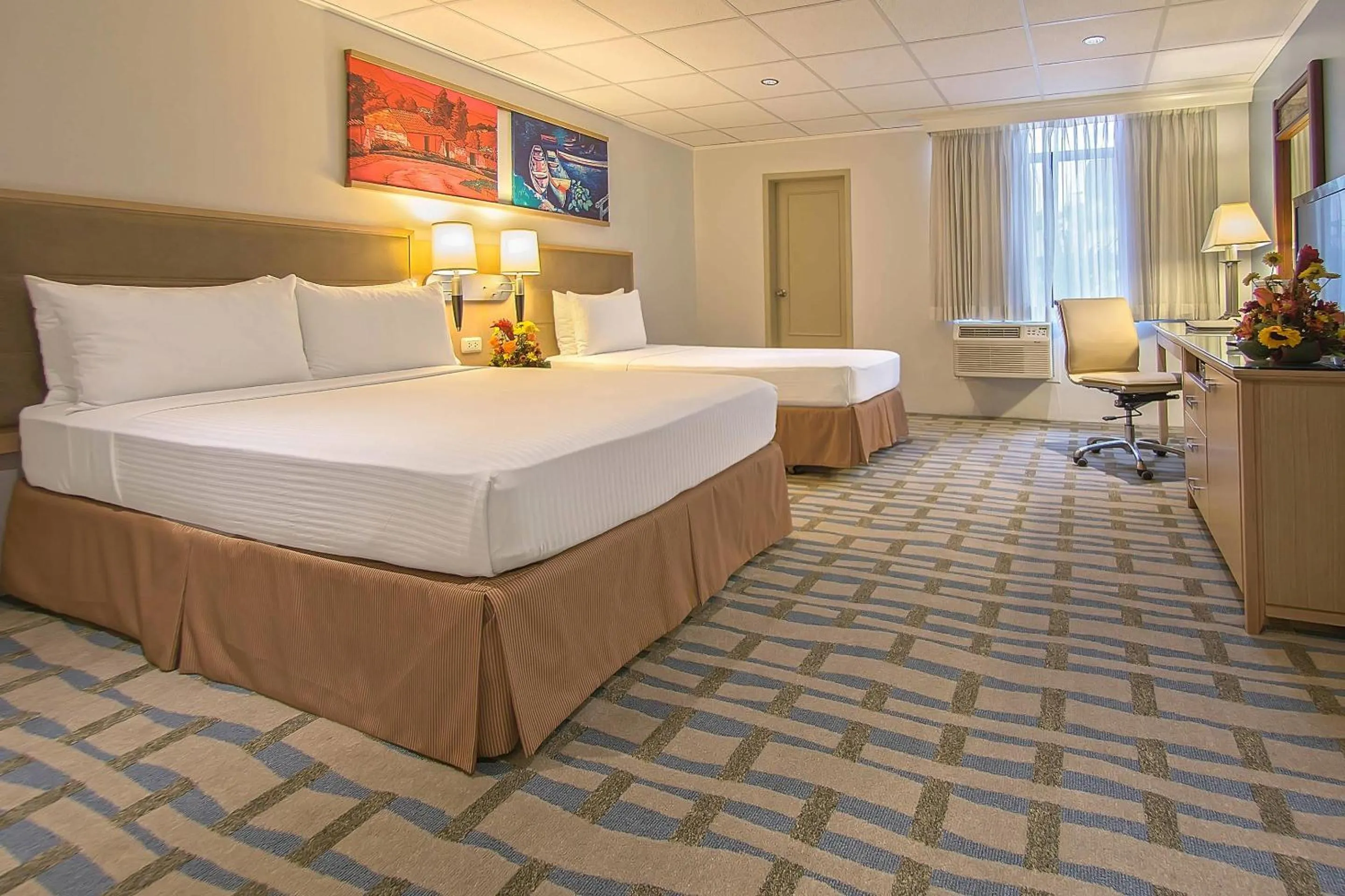 Bedroom, Bed in Grand Hotel Guayaquil, an Ascend Collection Hotel