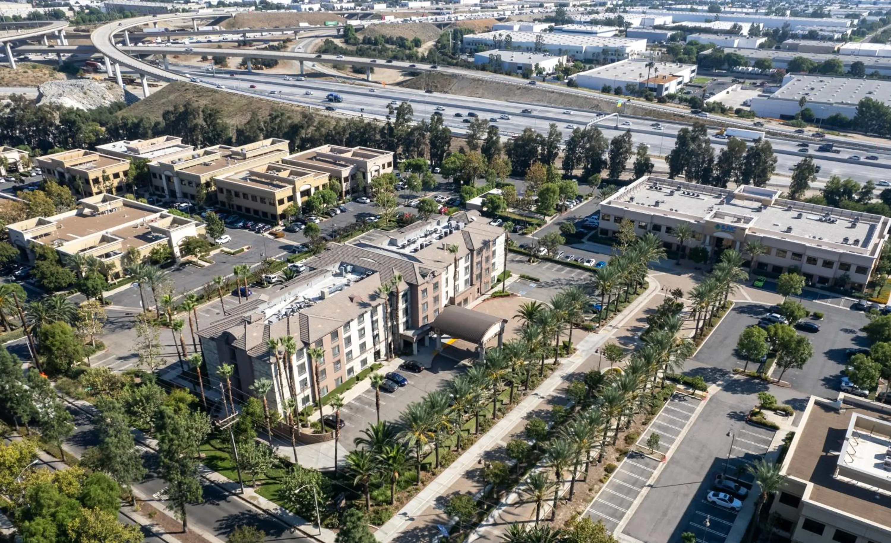 Property building in Country Inn & Suites by Radisson, Ontario at Ontario Mills, CA