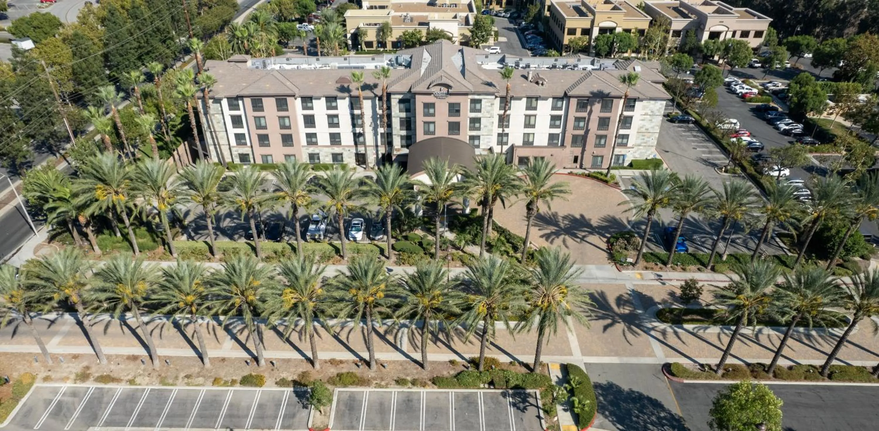 Property building in Country Inn & Suites by Radisson, Ontario at Ontario Mills, CA