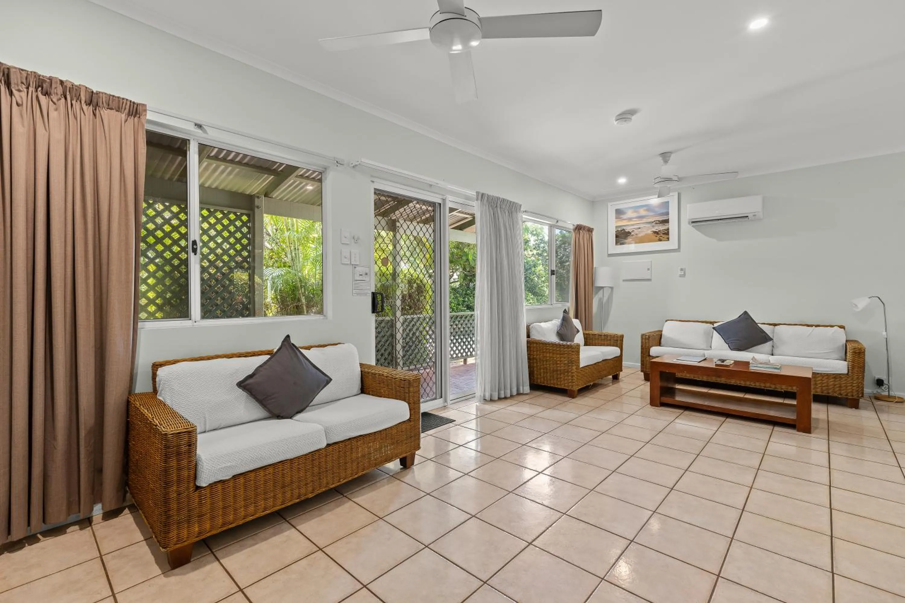 Living room, Bed in Cable Beachside Villas