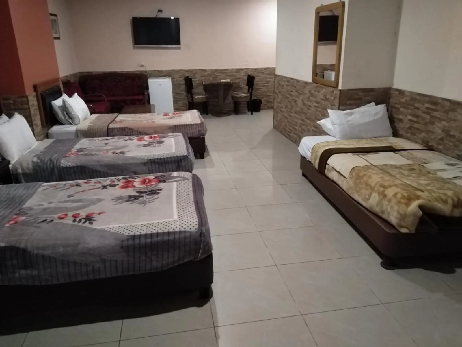 Bed in Amman Palace Hotel