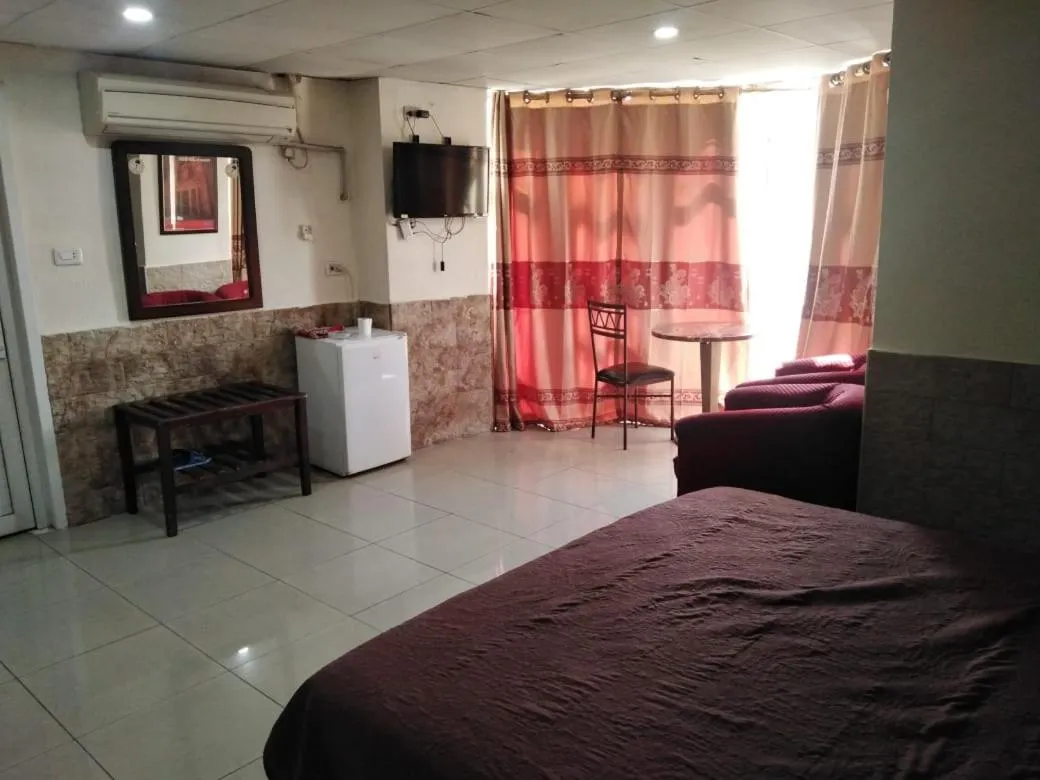 Bed in Amman Palace Hotel