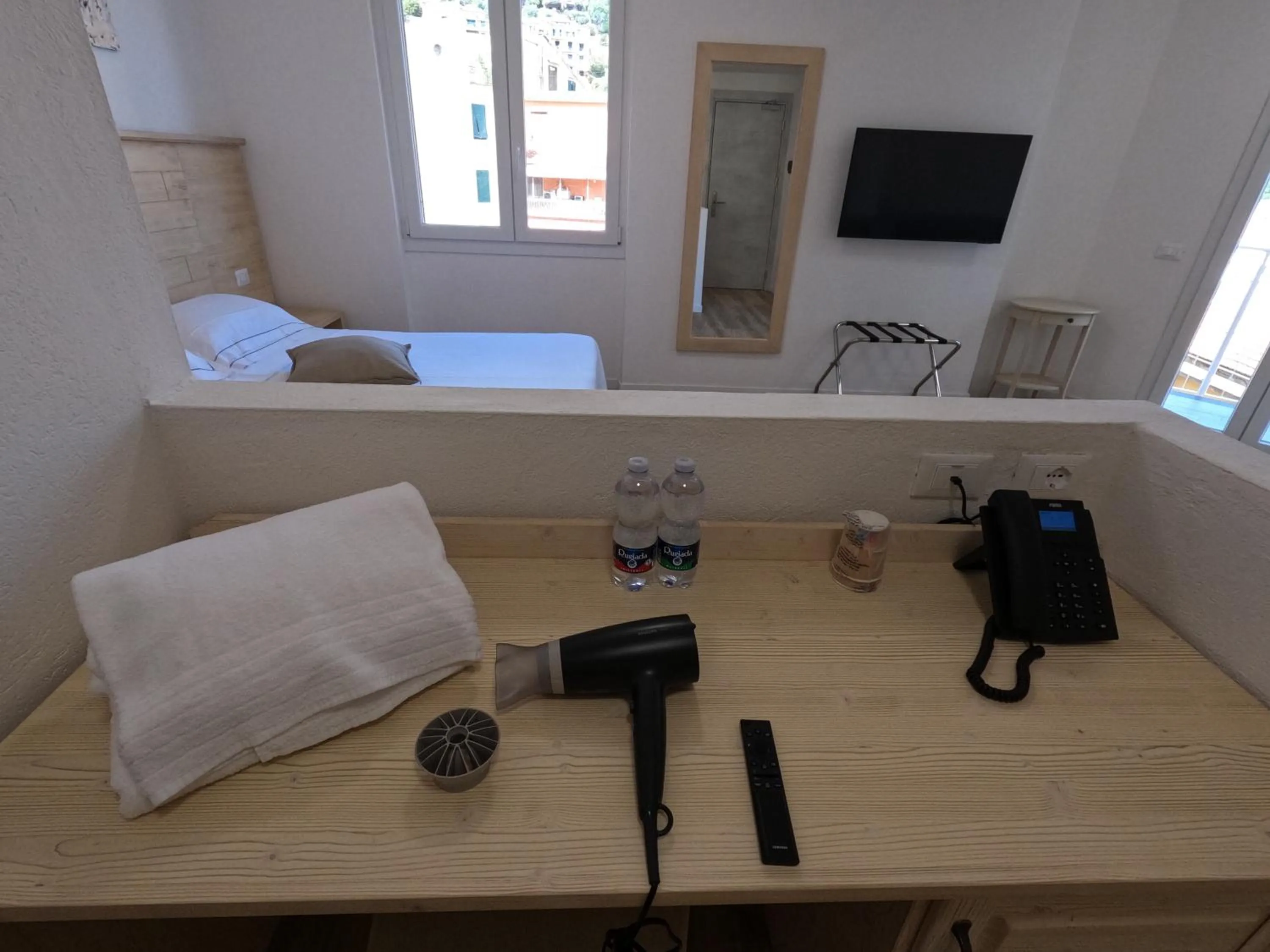 hair dryier, Bed in Hotel Week End