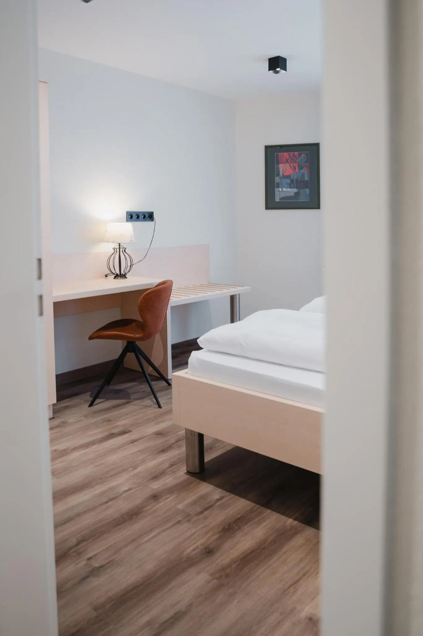 Photo of the whole room, Bed in Hotel Restaurant Tychon AG