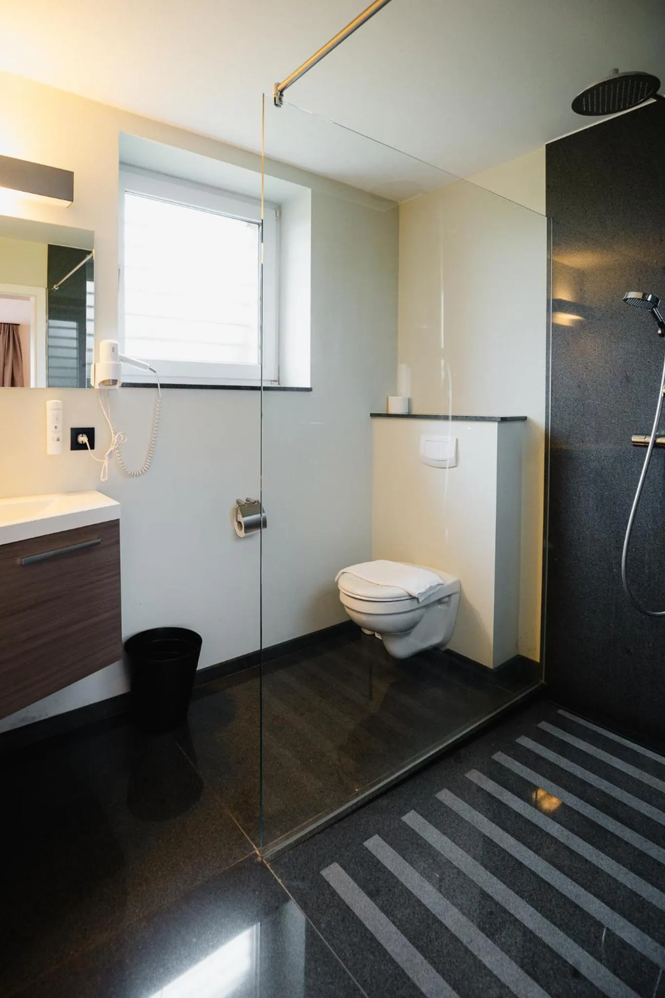 Bathroom in Hotel Restaurant Tychon AG