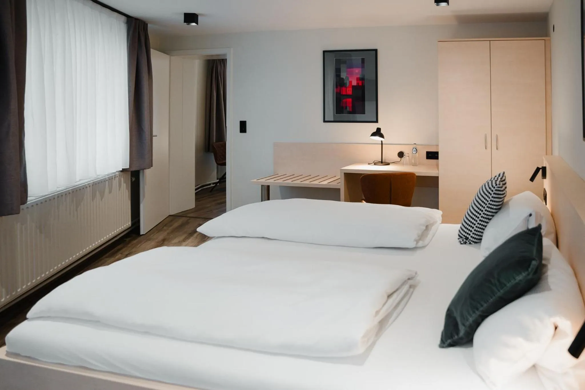 Photo of the whole room, Bed in Hotel Restaurant Tychon AG