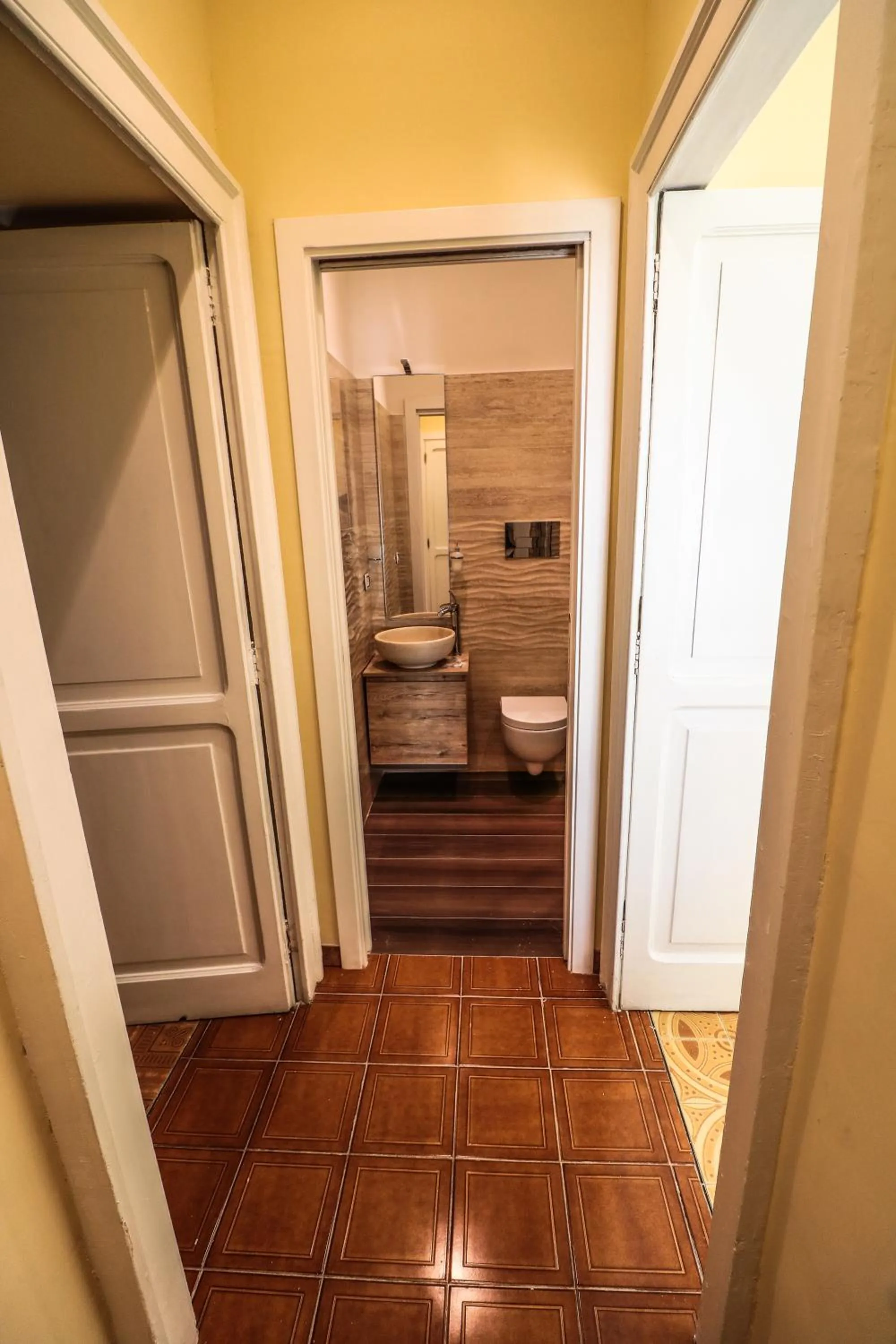 Toilet in Scognamiglio Suites