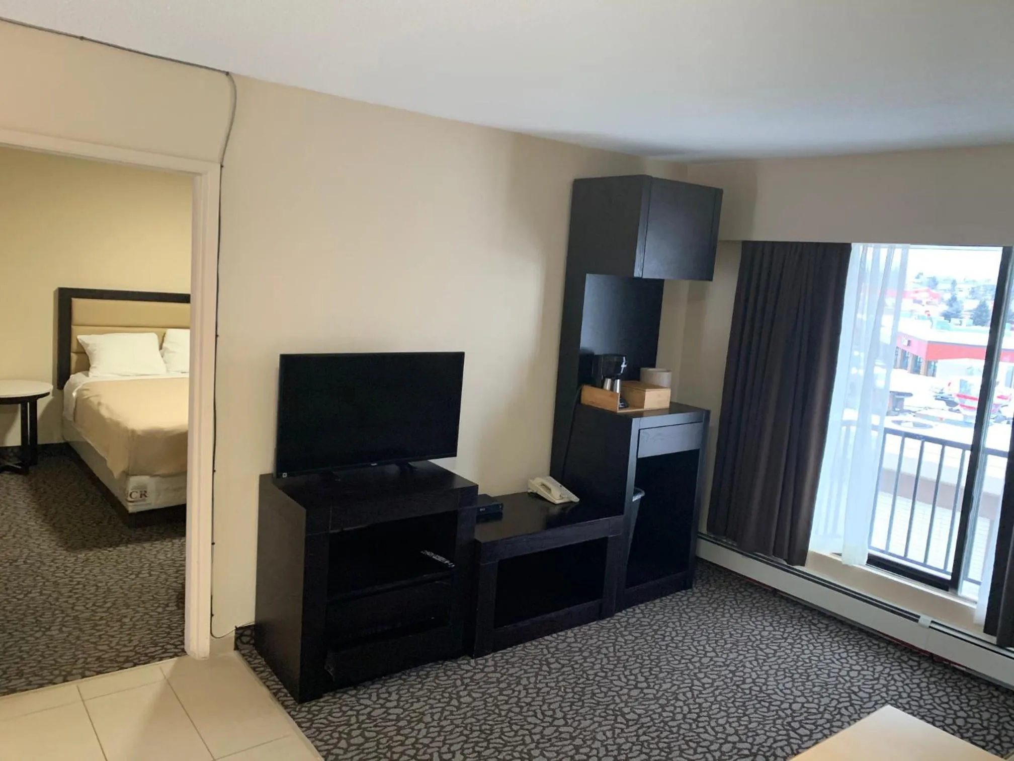 TV and multimedia, TV/Entertainment Center in North Star Inn & Suites