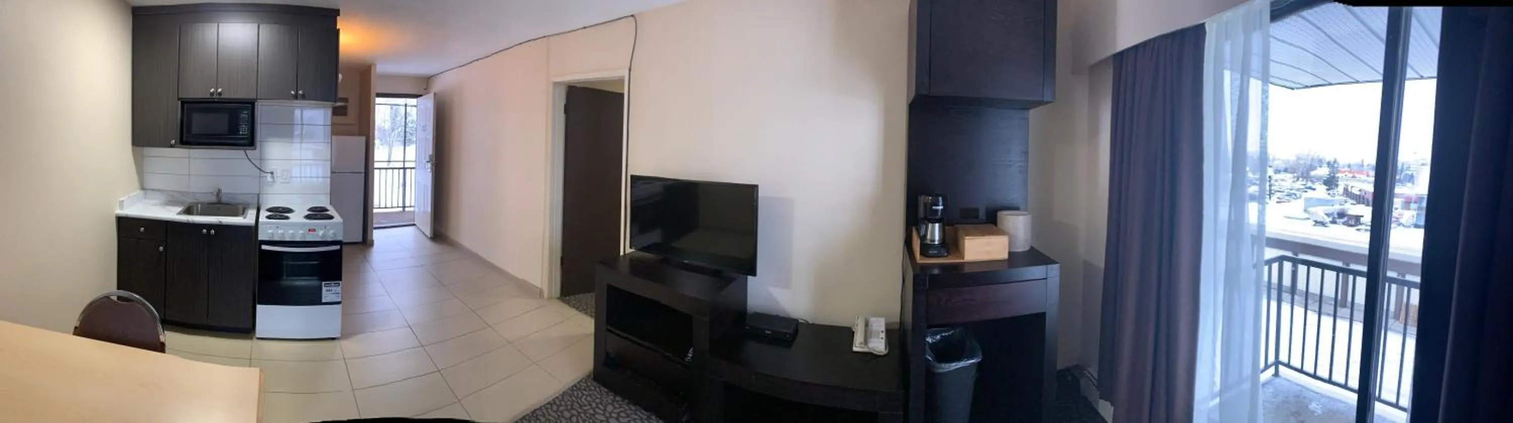 TV and multimedia, TV/Entertainment Center in North Star Inn & Suites