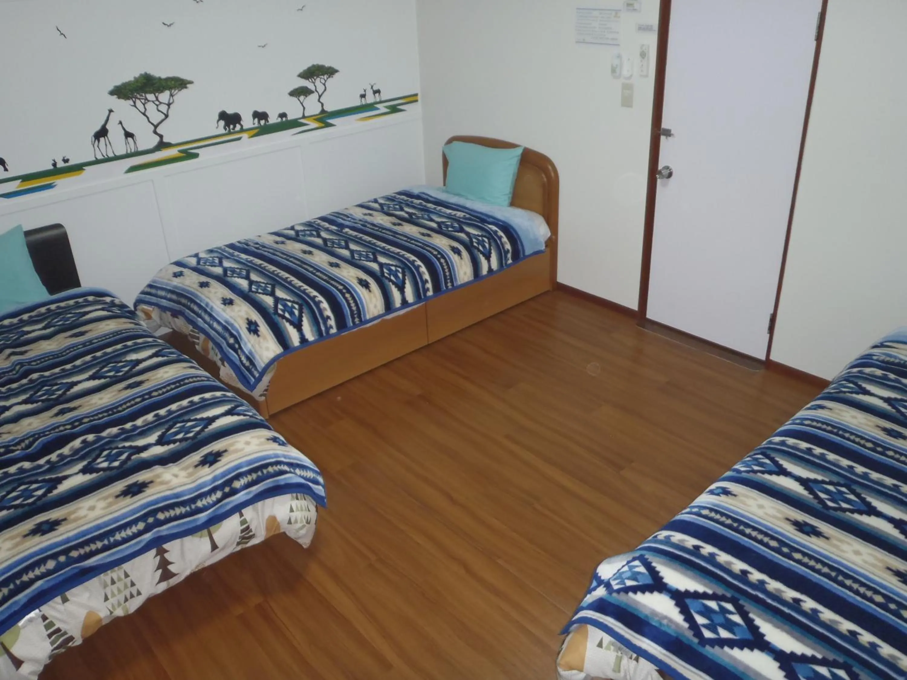 Property building, Bed in Mike's B&B Tokoname