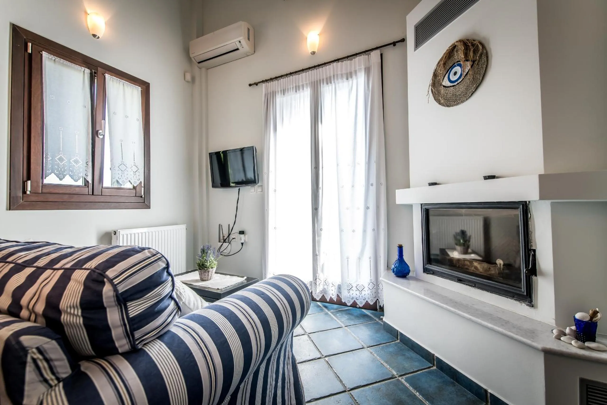 Seating area, Bed in Nymfes