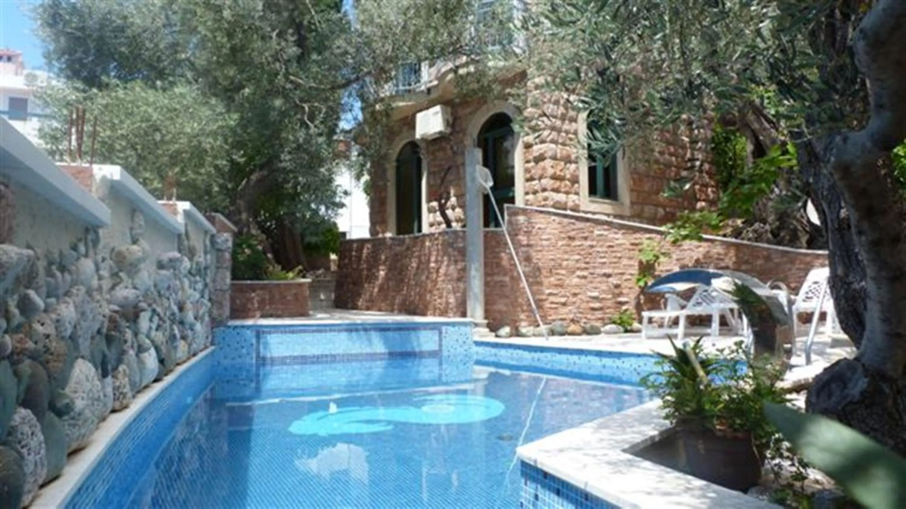 Swimming pool in Apartments and Rooms Levantin Inn