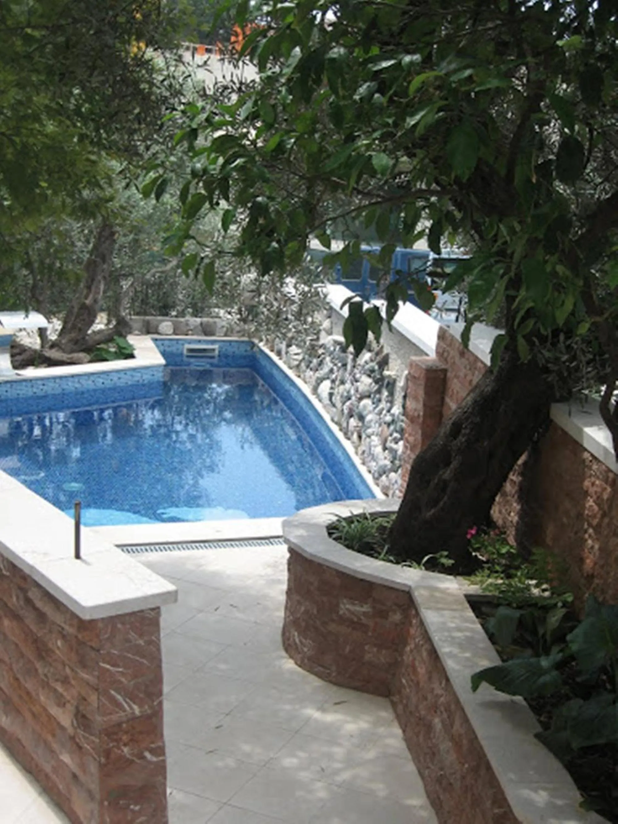 Swimming pool in Apartments and Rooms Levantin Inn