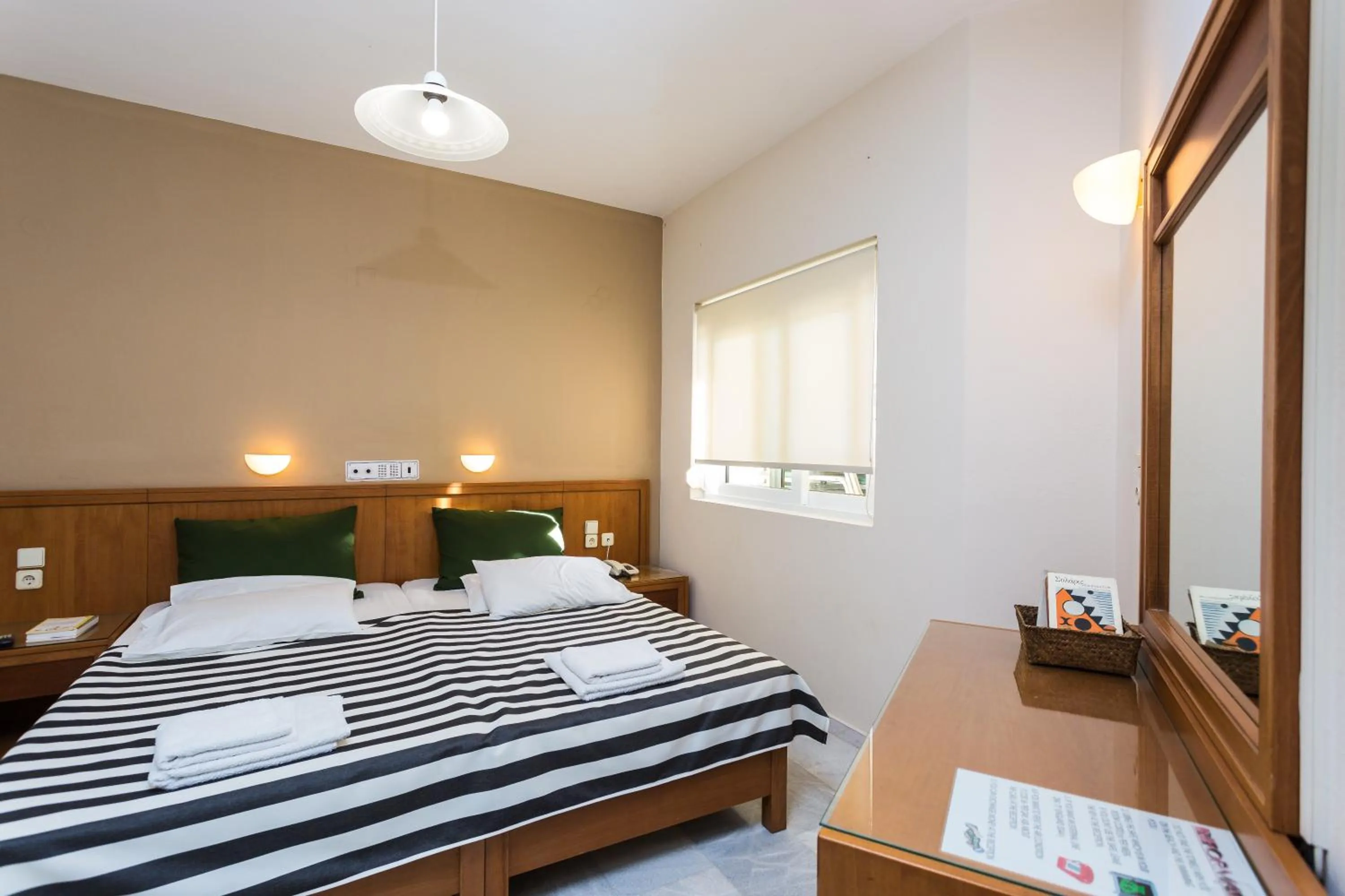 Bedroom, Bed in Radamanthy's Hotel Apartments