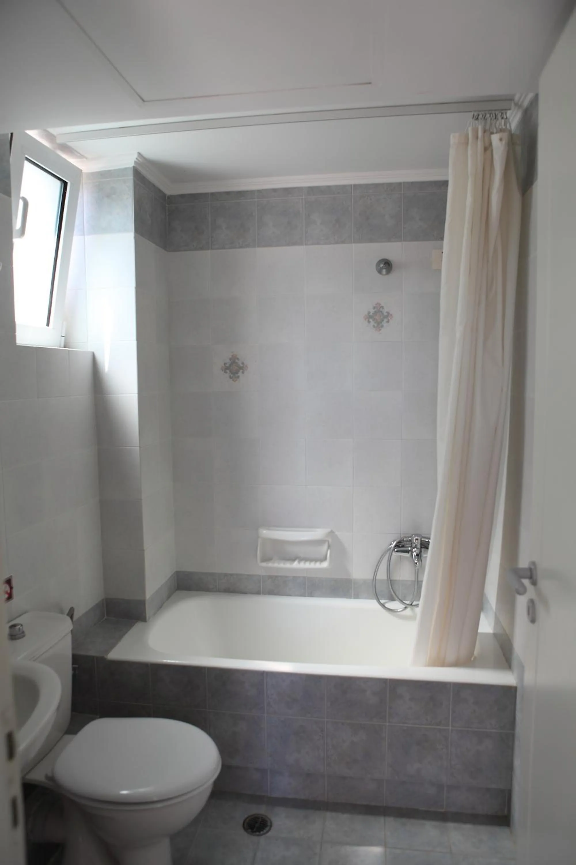 Bathroom in Radamanthy's Hotel Apartments