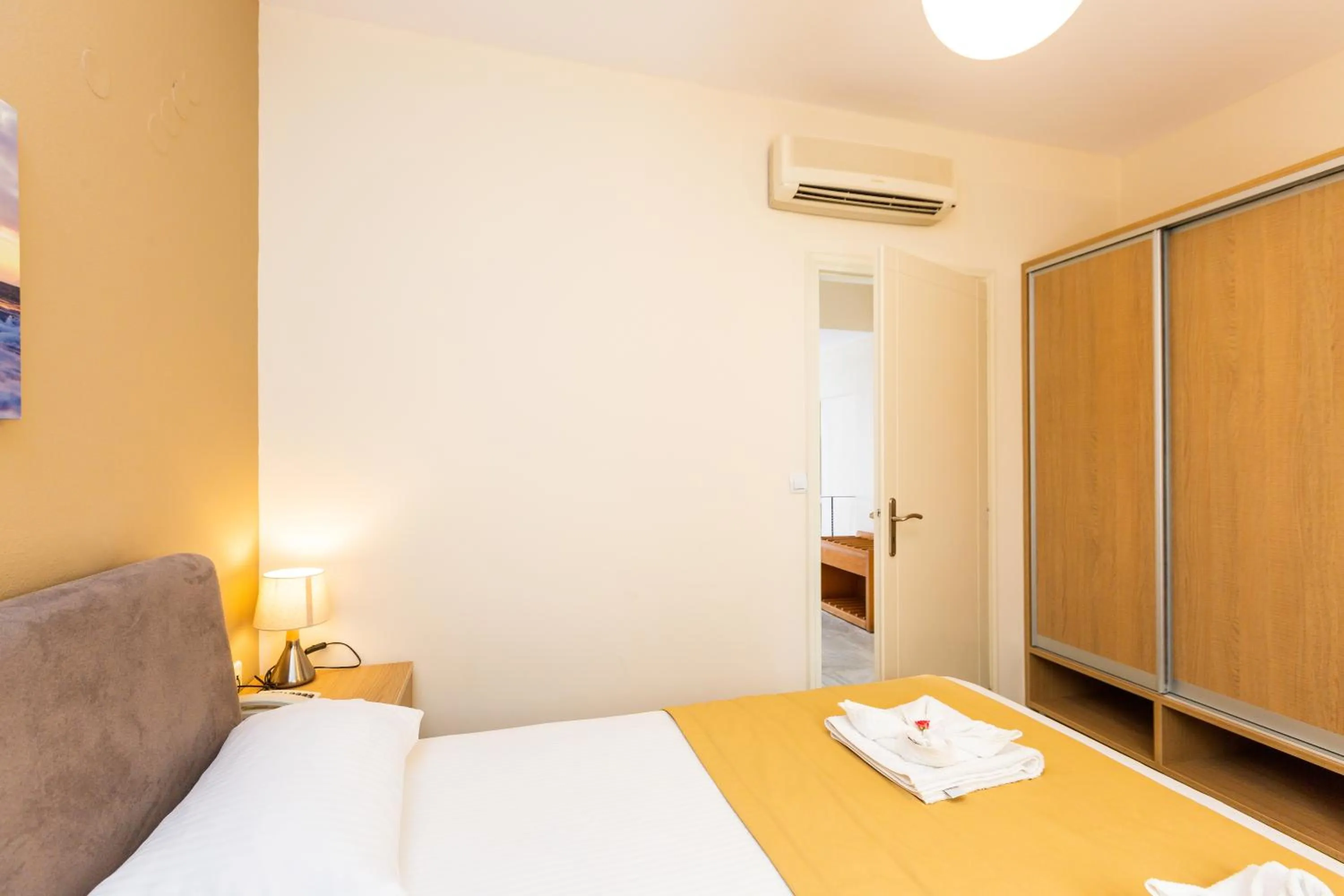 Bedroom, Bed in Radamanthy's Hotel Apartments