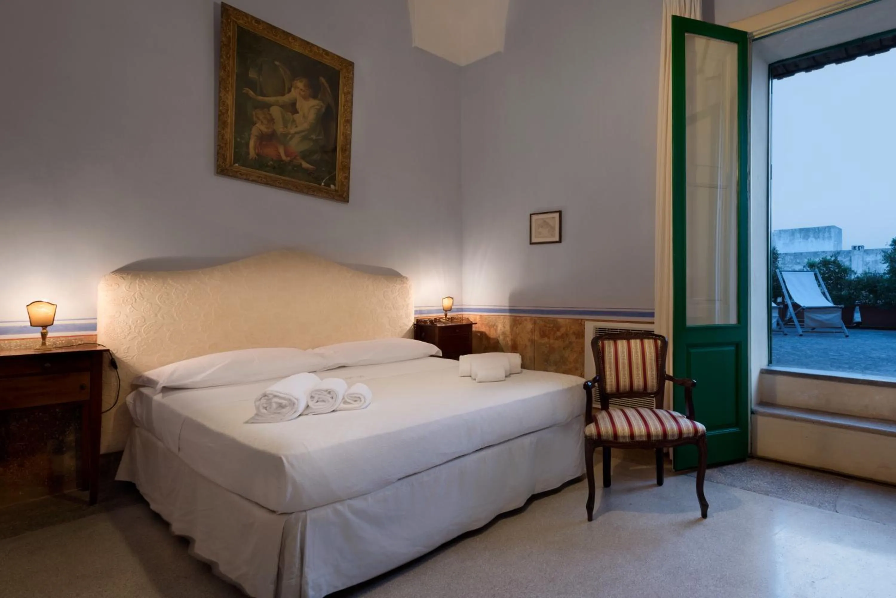 Photo of the whole room, Bed in Palazzo Laura