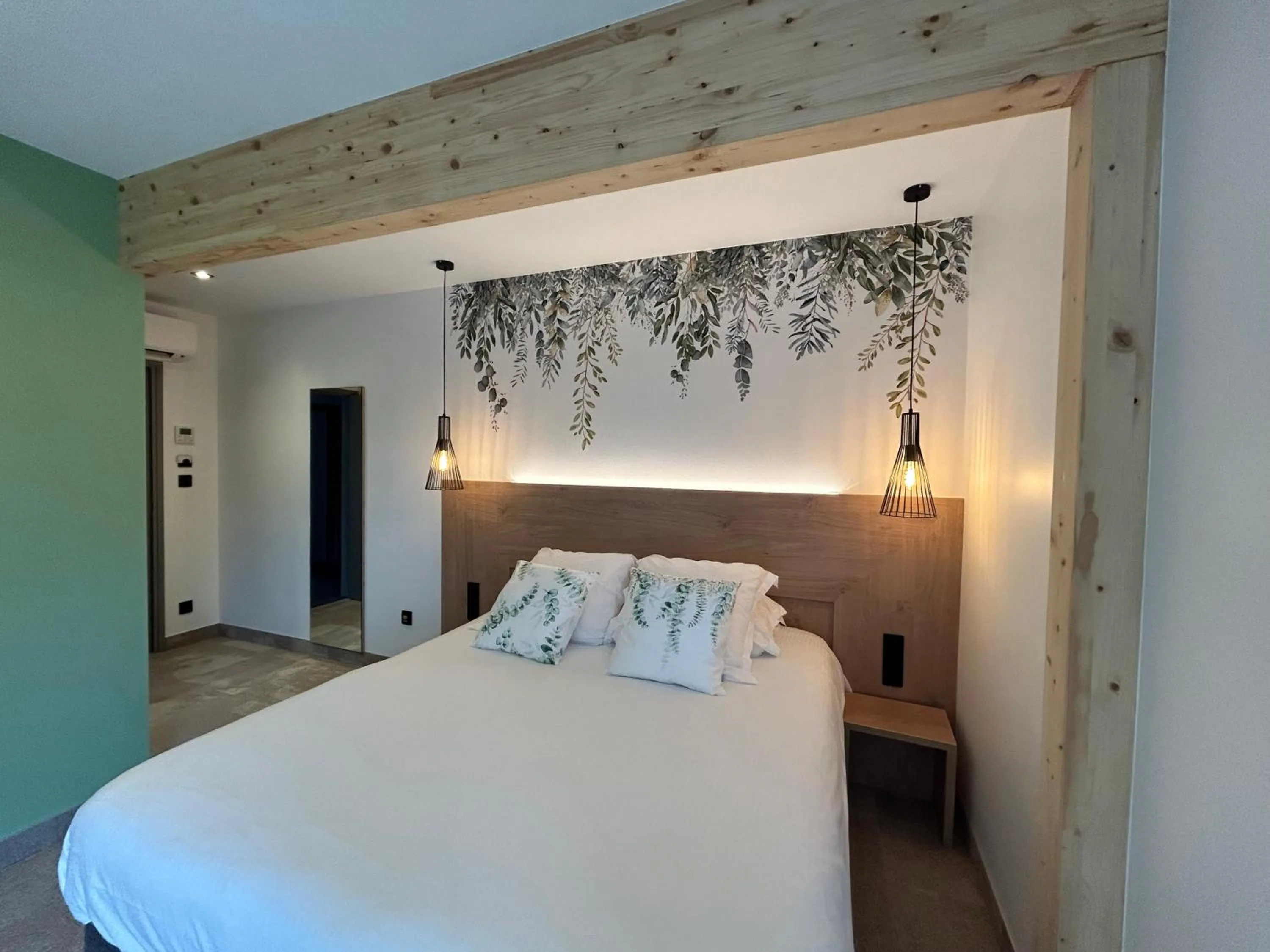 Bedroom, Bed in Les Orchidées , Hôtel & Restaurant