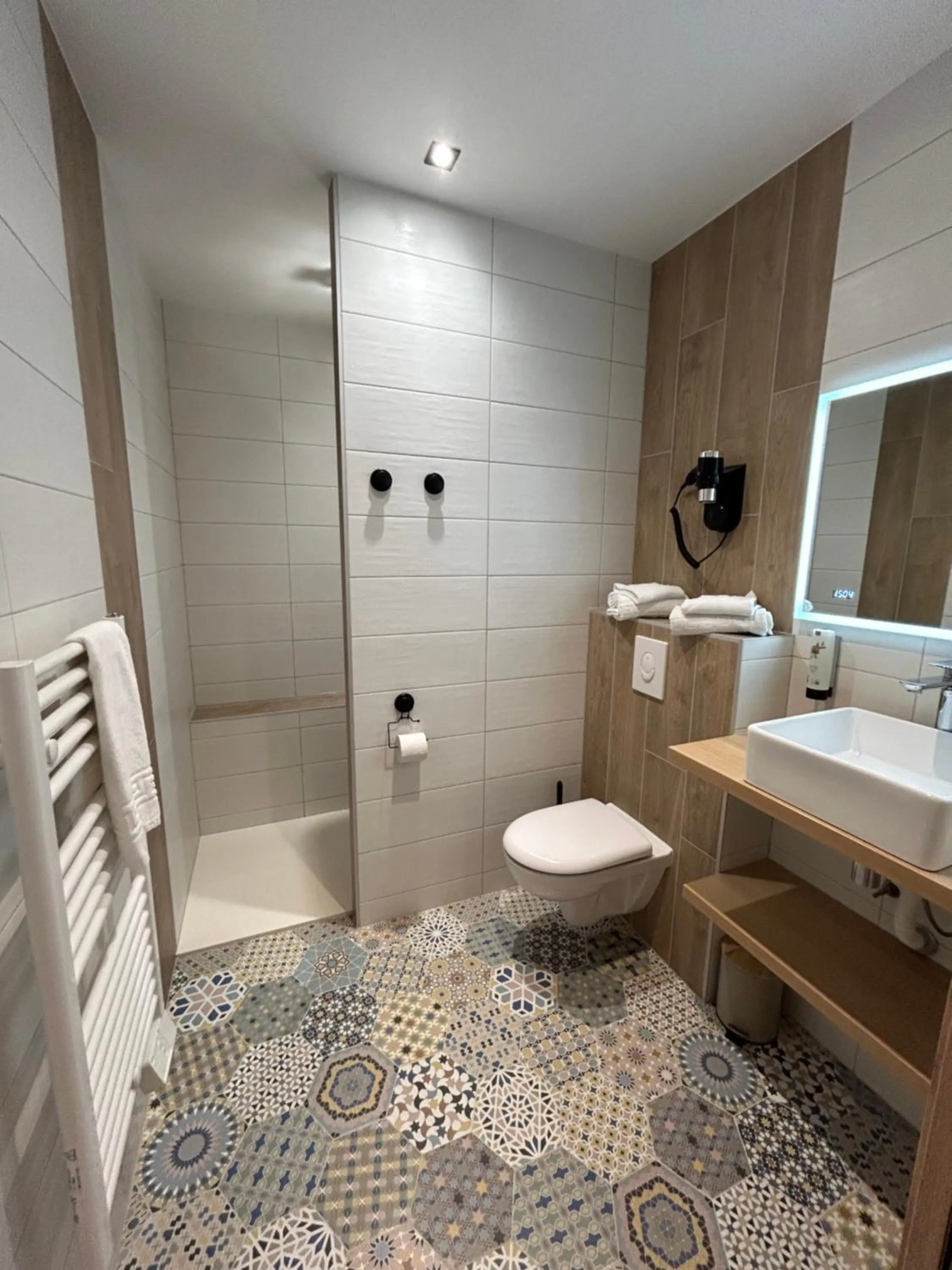 Bathroom in Les Orchidées , Hôtel & Restaurant