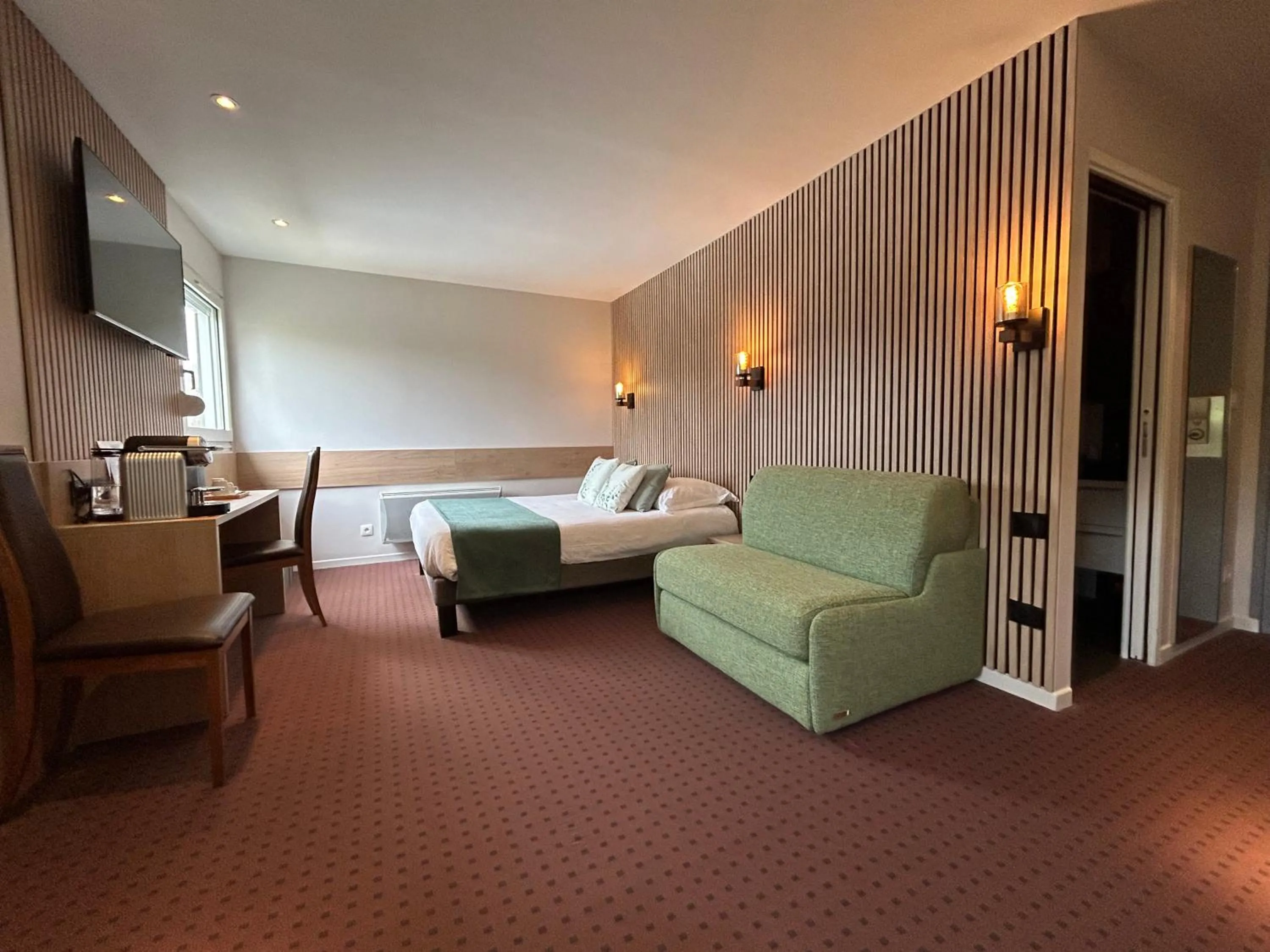 Bed in Les Orchidées , Hôtel & Restaurant