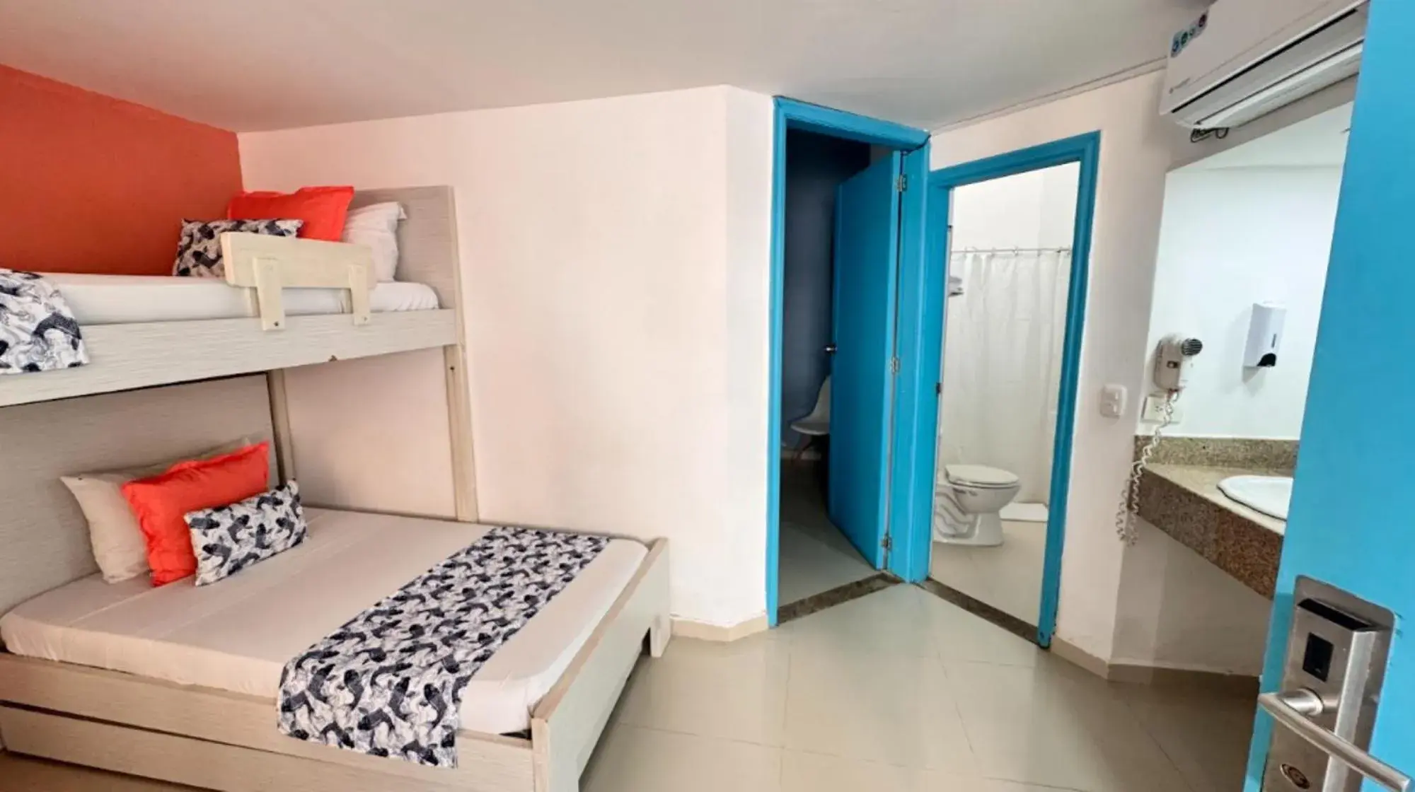 Bed in TAMA Hotel Santa Marta Bed in TAMA Hotel Santa Marta