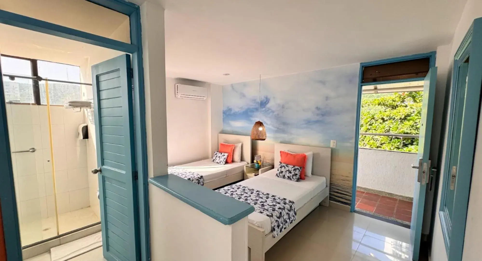 Bed in TAMA Hotel Santa Marta Bed in TAMA Hotel Santa Marta