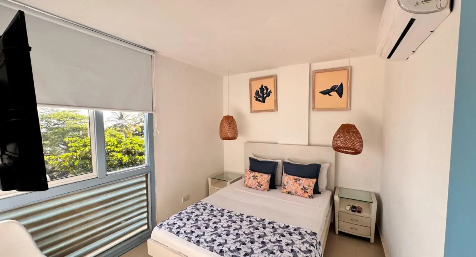 TV and multimedia, Bed in TAMA Hotel Santa Marta TV and multimedia, Bed in TAMA Hotel Santa Marta