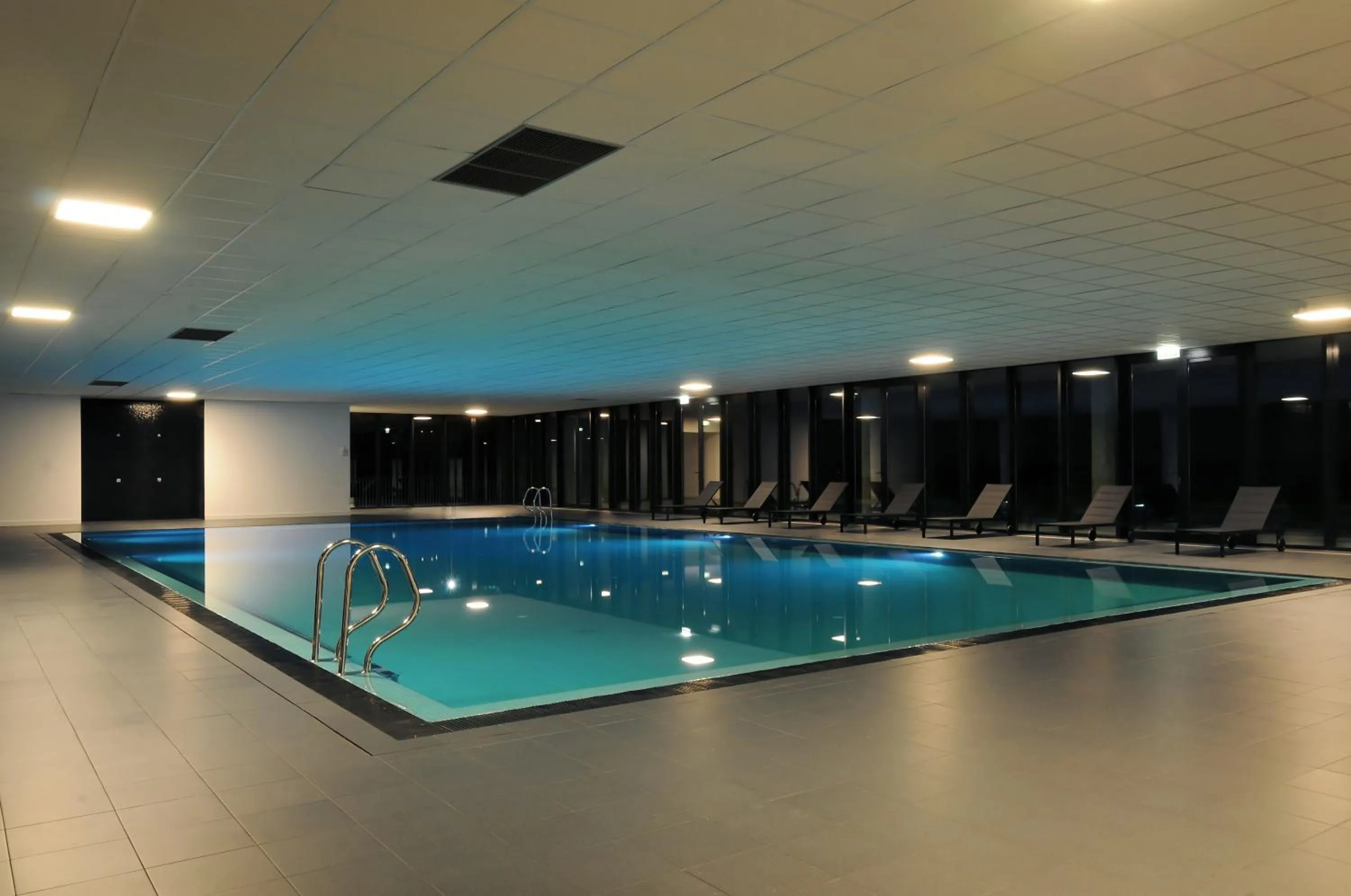 Swimming pool in Open Village Sports Hotel & Spa Club