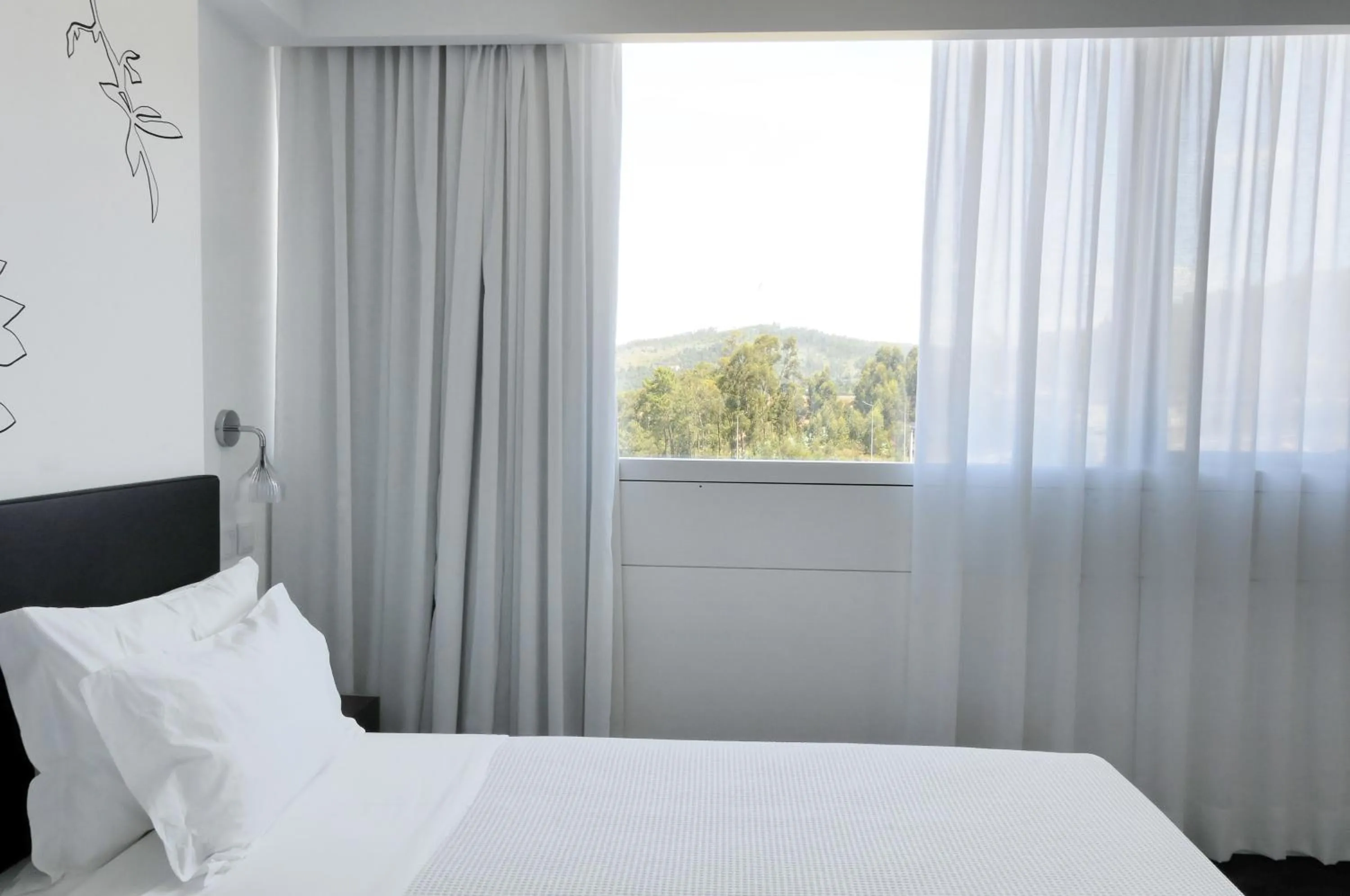 Bed in Open Village Sports Hotel & Spa Club