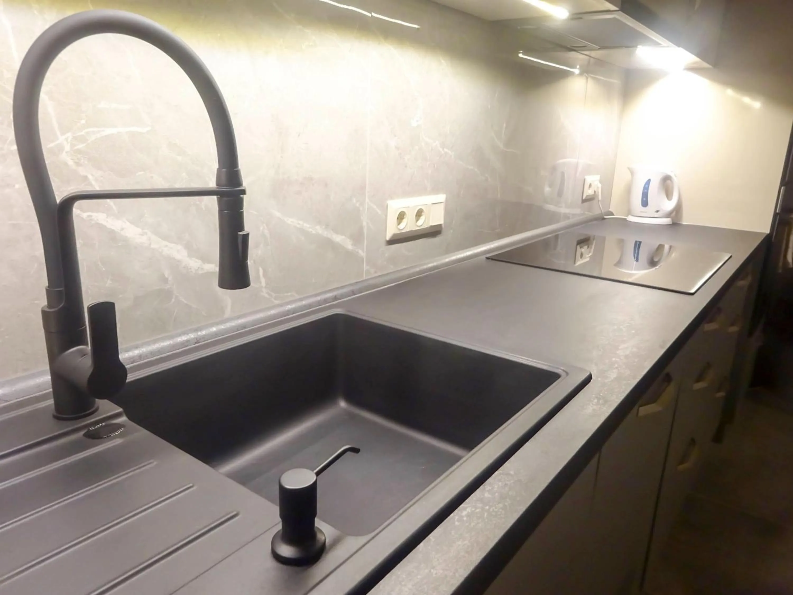 Kitchen or kitchenette in Corvin Point Rooms and Apartments