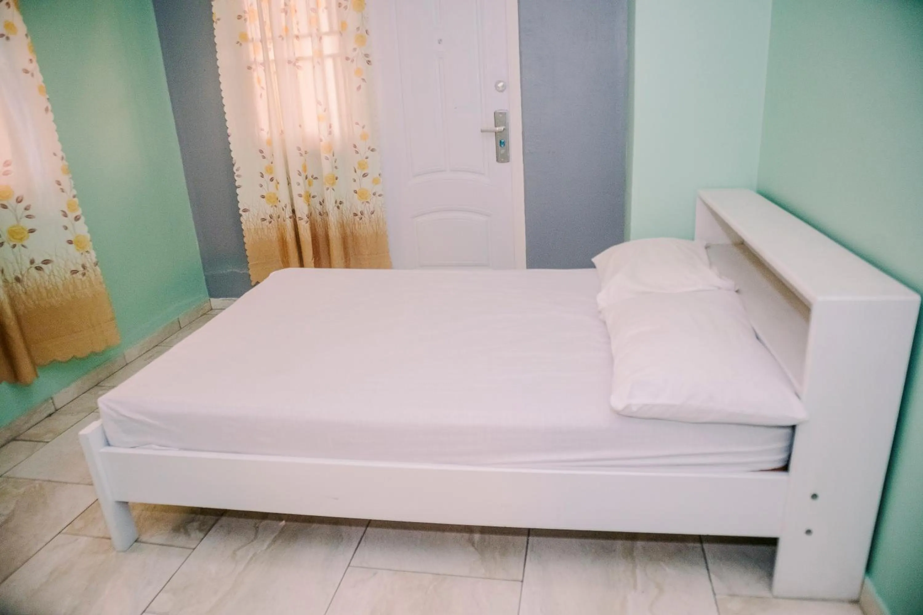 Bed in Happy Holidays Style Residences