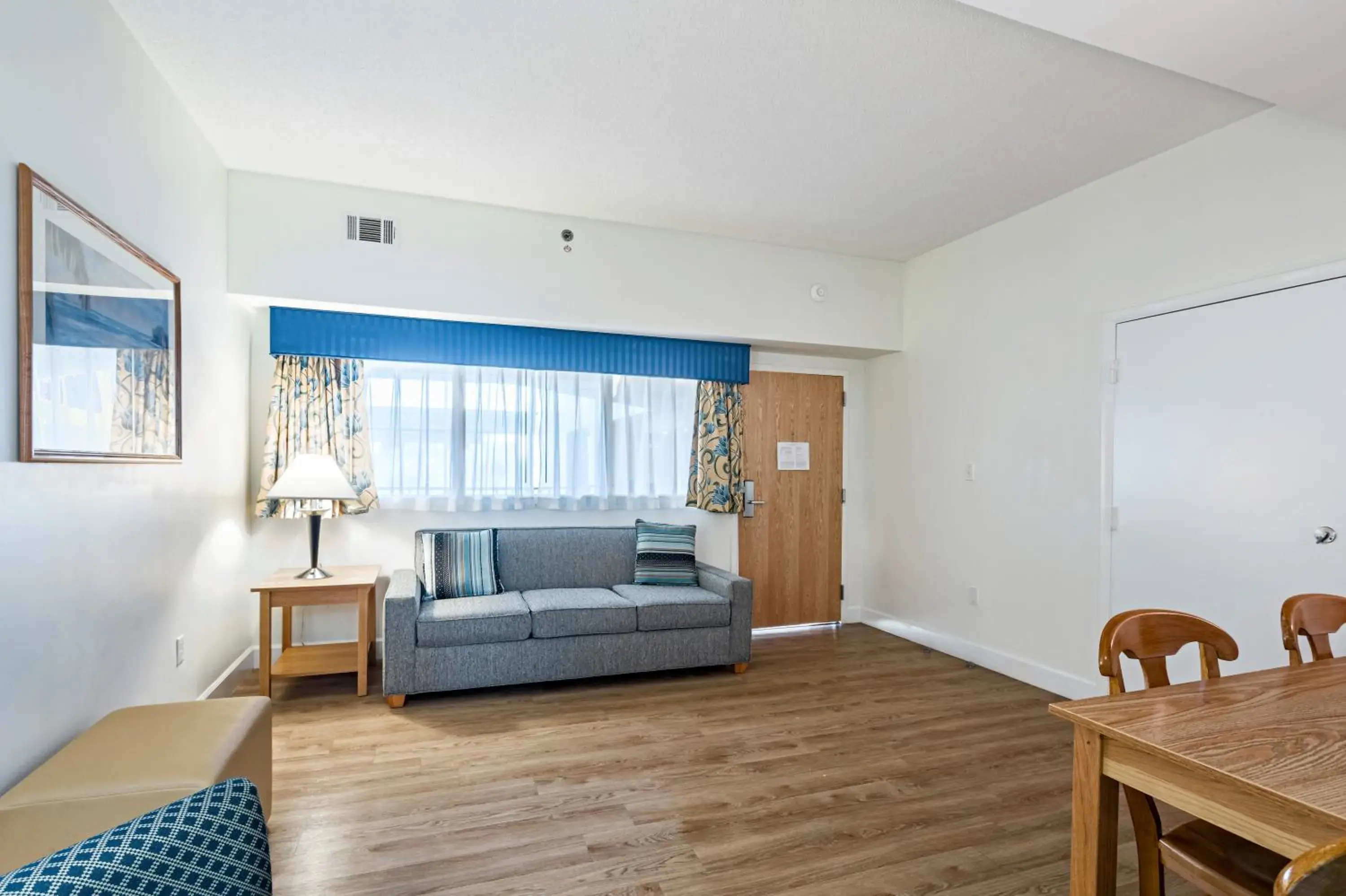 Living room in The Atrium Resort, Virginia Beach by Vacatia Living room in The Atrium Resort, Virginia Beach by Vacatia