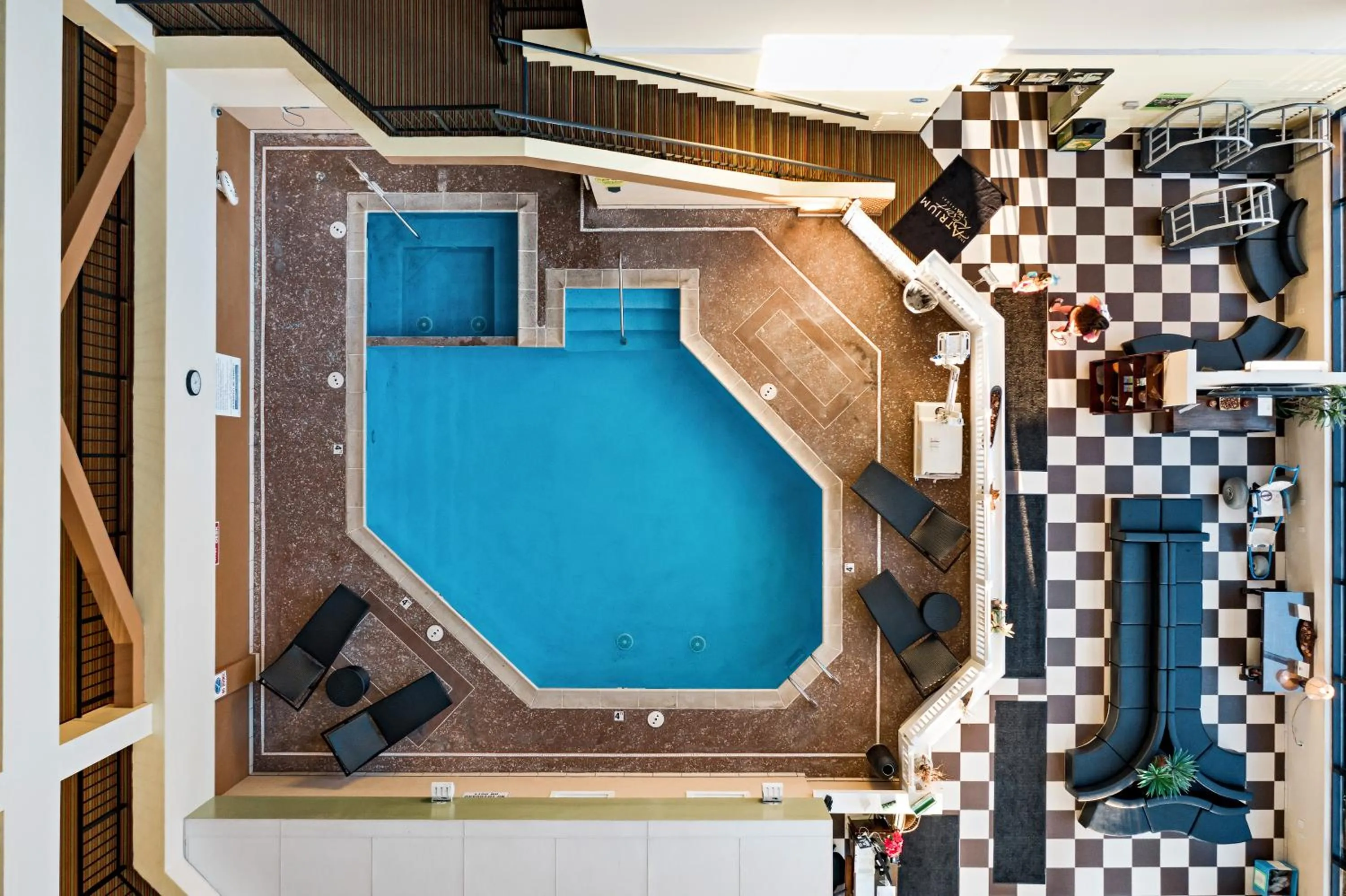 Swimming pool in The Atrium Resort, Virginia Beach by Vacatia