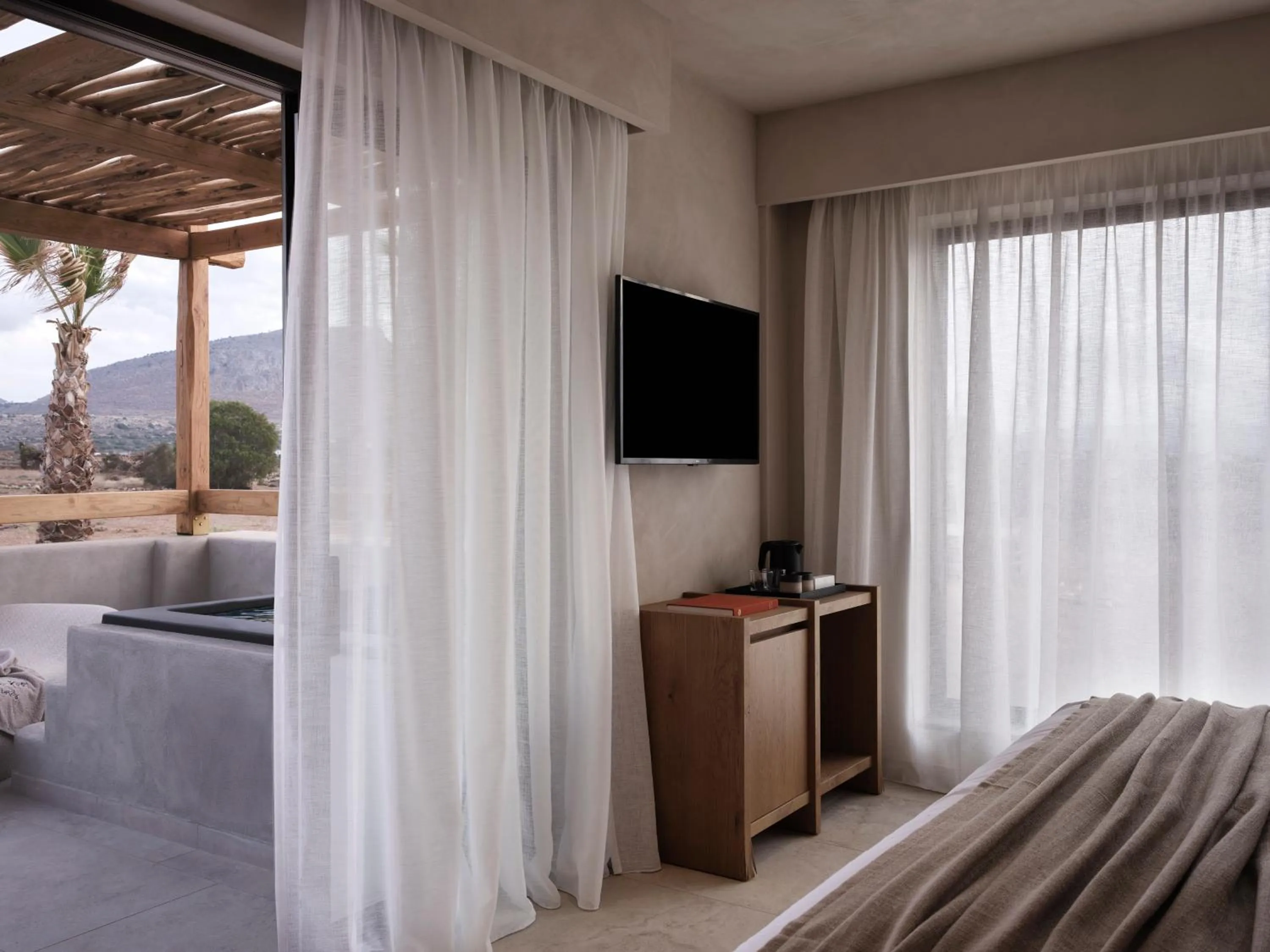 Bed in Stella Blue Seaside Resort